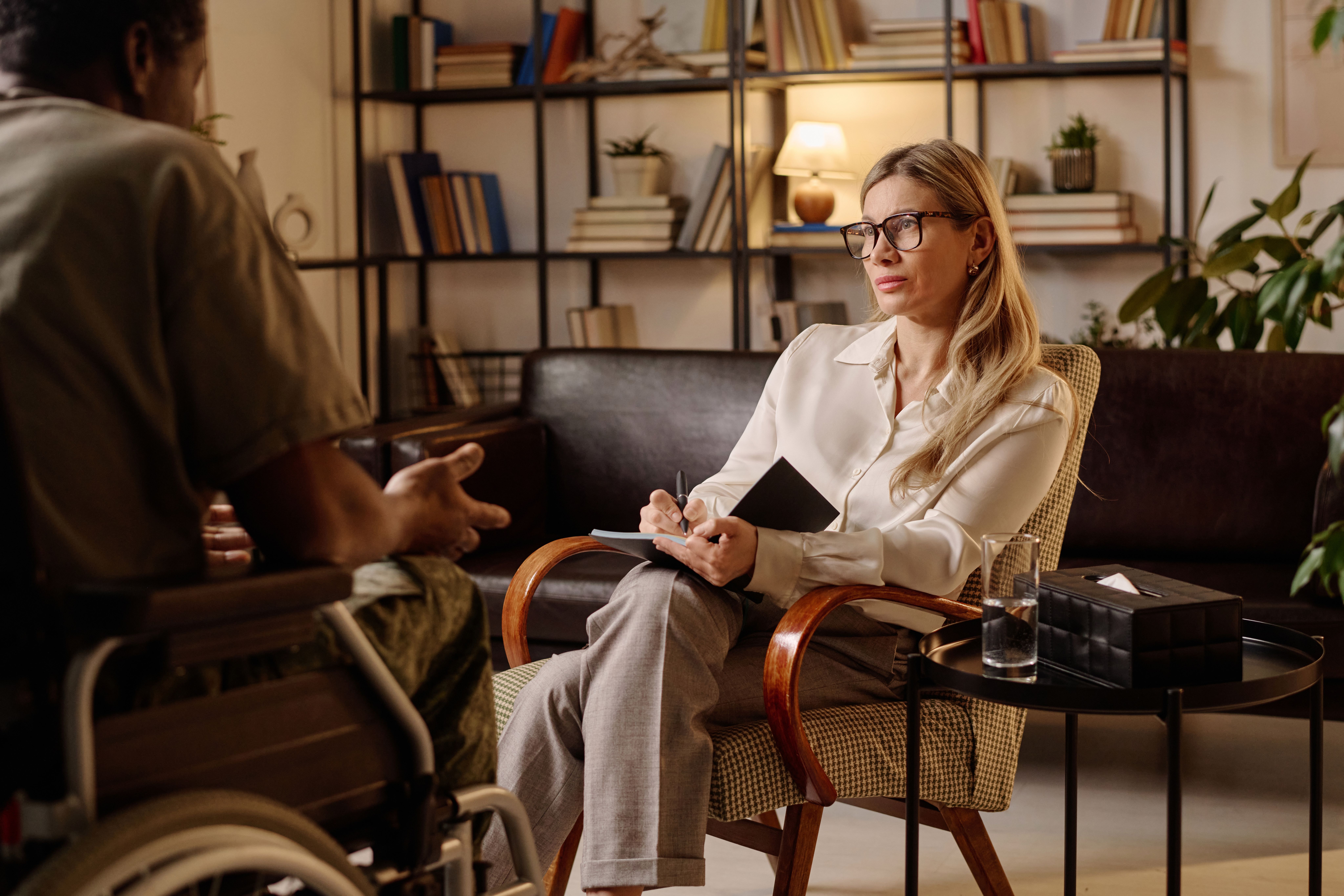A woman interviewing a man
