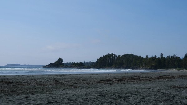 Some sand and water somewhere on an island