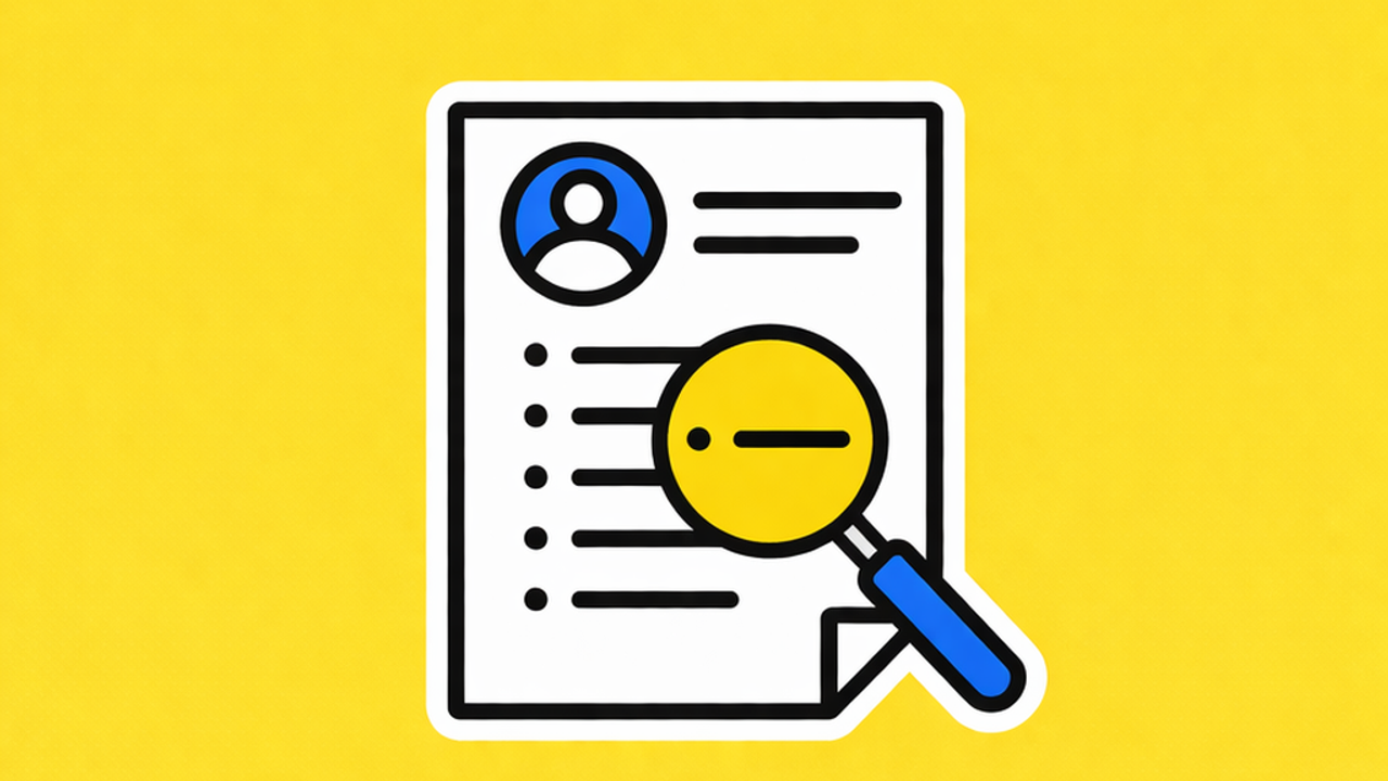 magnifying glass over a resume