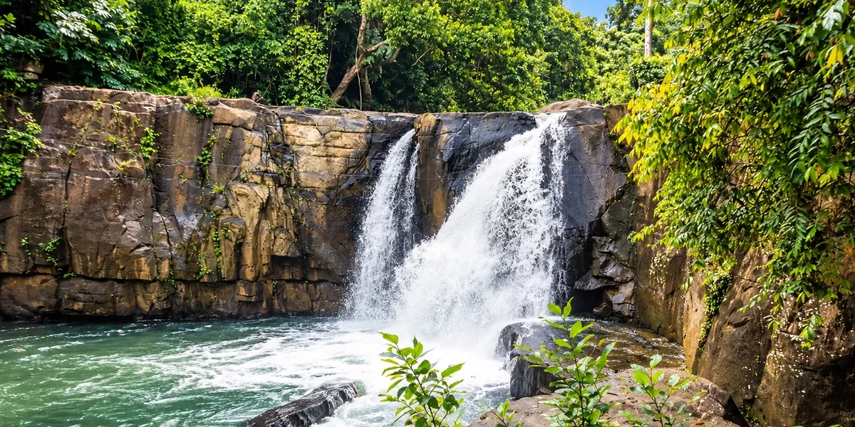 Rotumba Biso Ella waterfall in Matara district, Sri Lanka, with the viewing platform beside the river