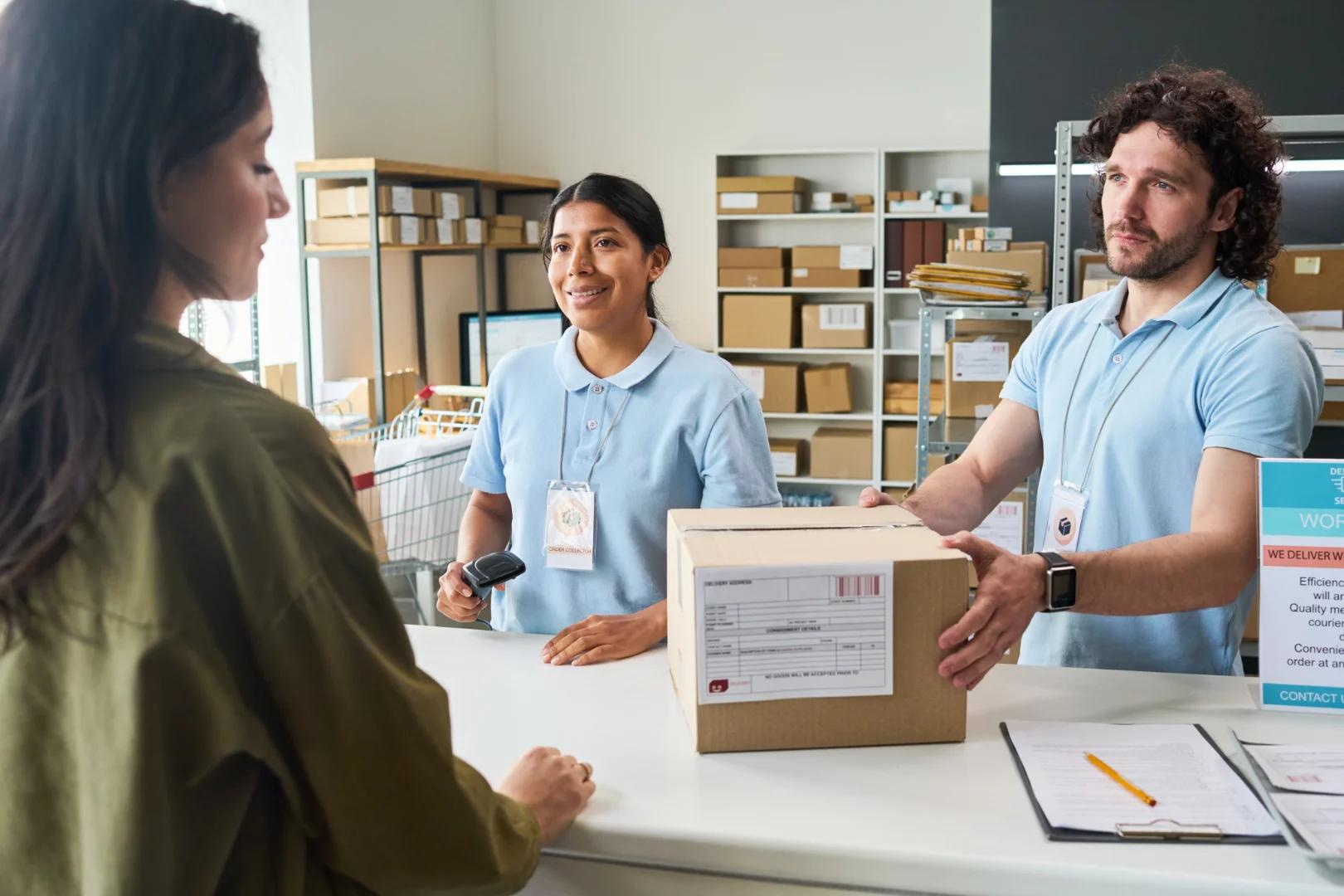 A parcel label being scanned at a drop off counter