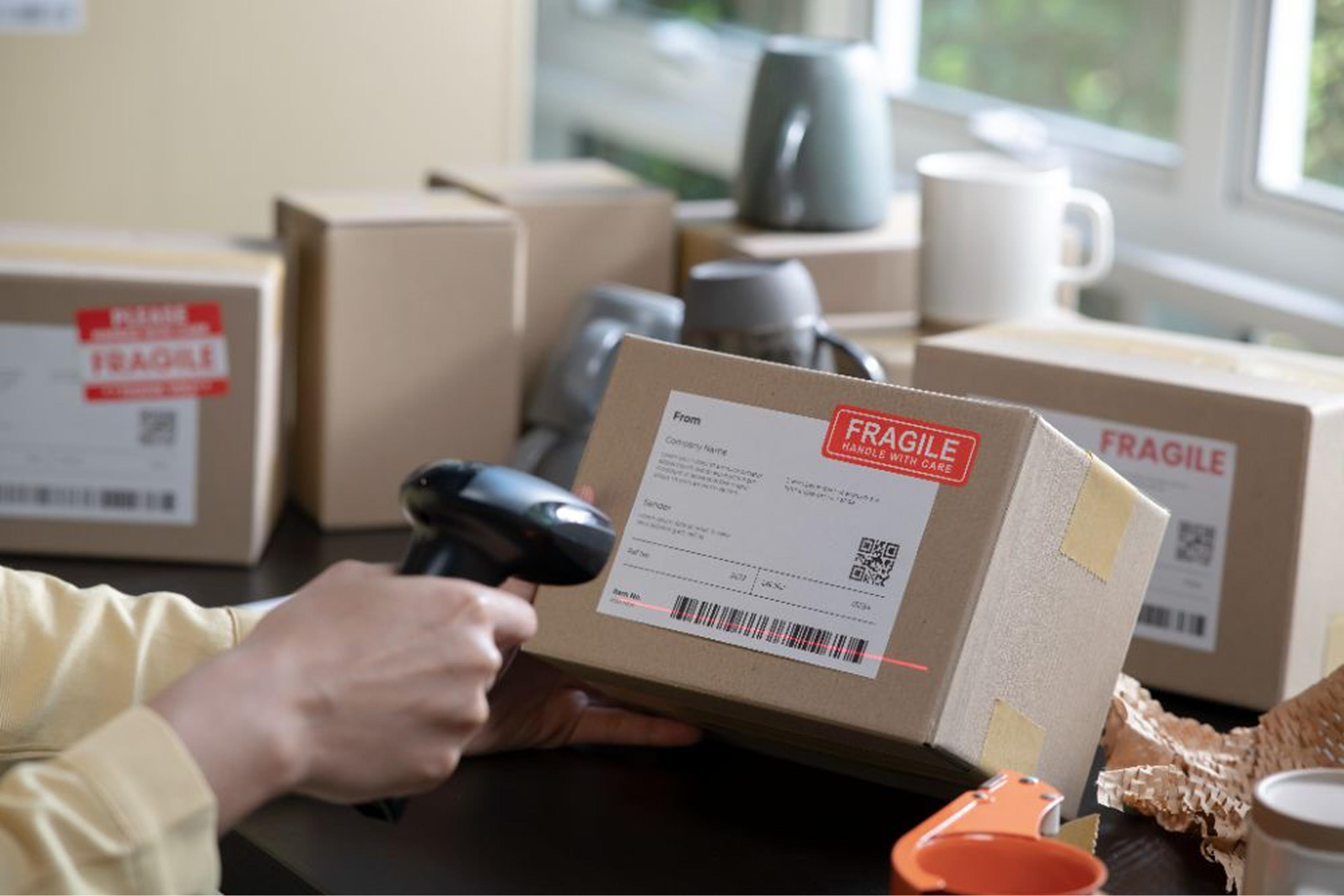 Scanning a parcel barcode at a workbench