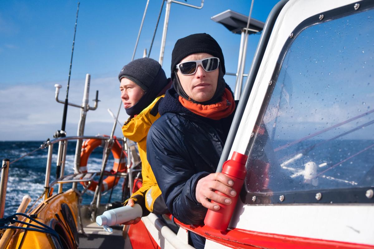 Isak Rockström (Skipper) and Rakel Thorell (Crew Member) sailing the Abel Tasman, Ocean Bottles in hand. Credit: Alex Rockström