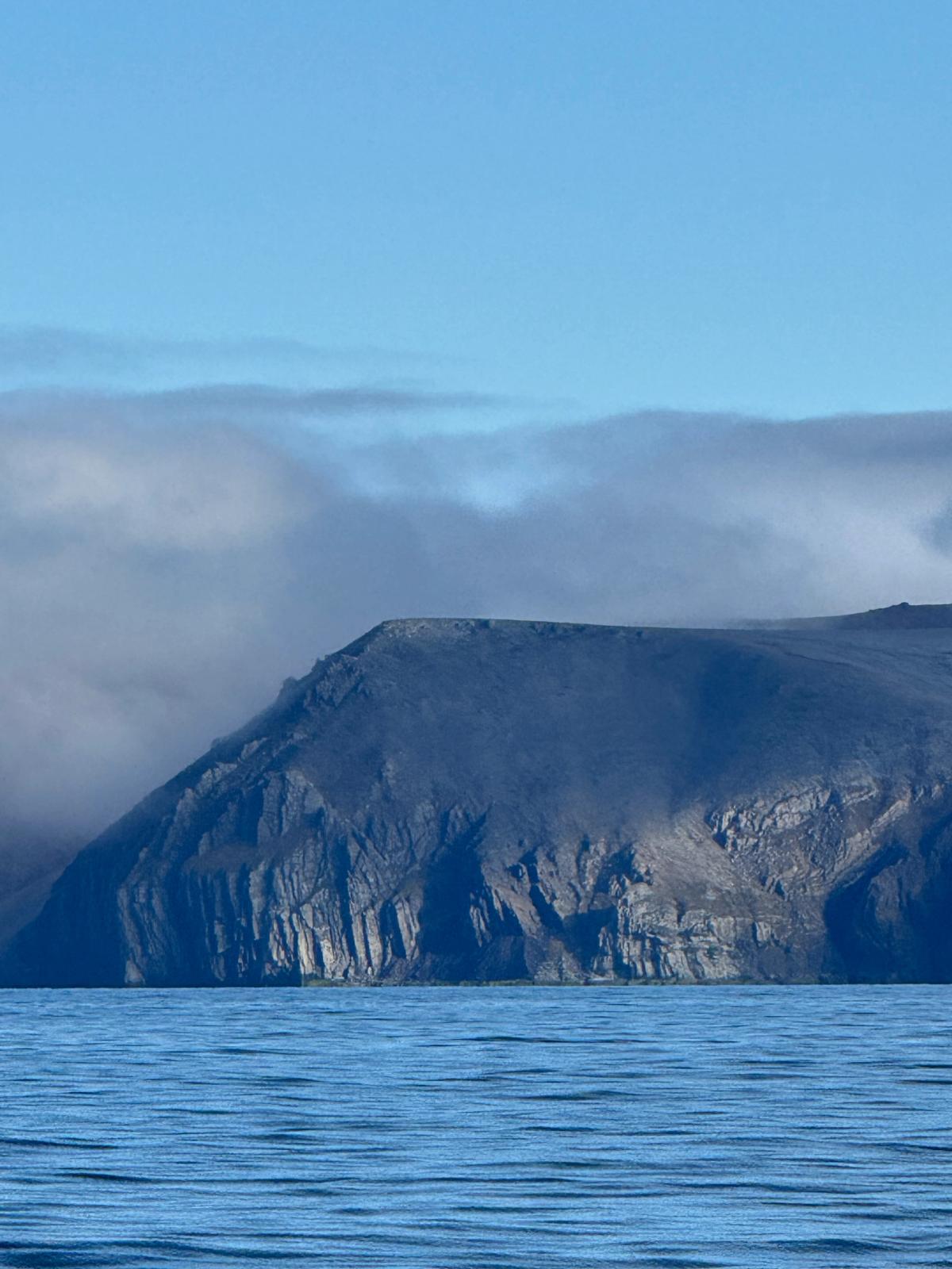 Mountains rise out of the sea near Point Hope, Alaska. Credit: Keith Tuffley