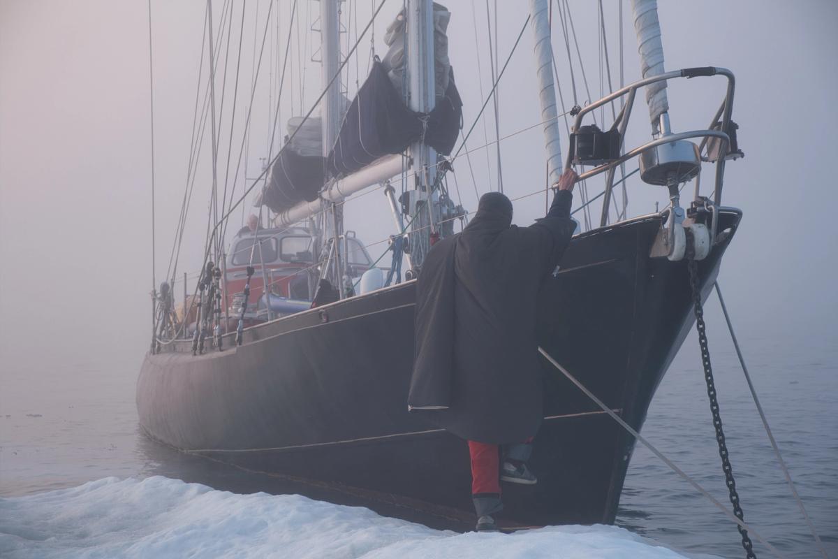 Skipper Isak Rockström boards the Abel Tasman, ready to depart towards Cambridge Bay. Credit: Alex Rockström