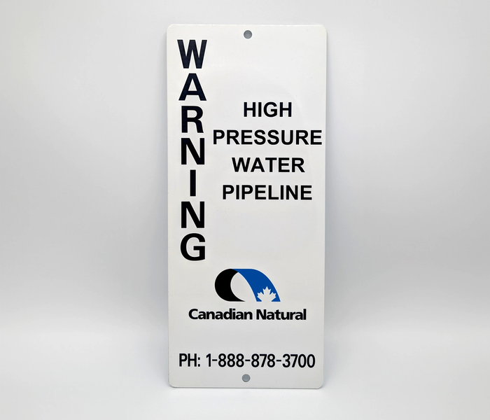 Canadian Natural high pressure water pipeline warning sign