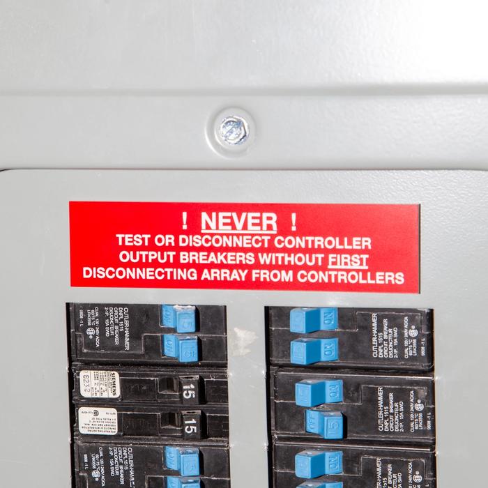 Electrical panel red warning sign