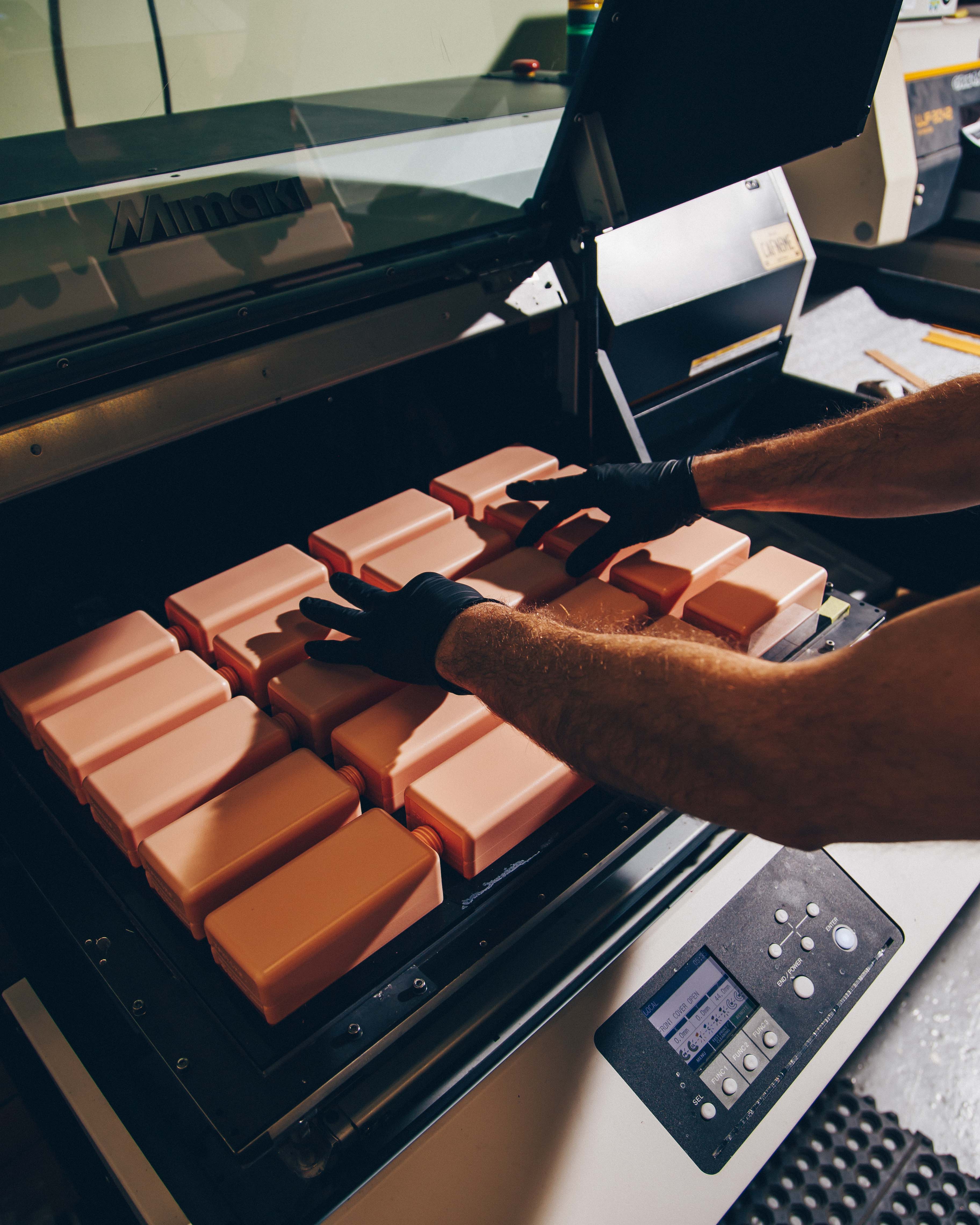 pink shampoo containers with no labelling