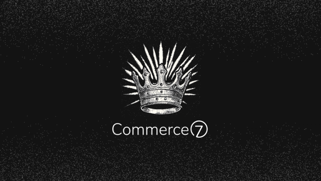 The Commerce7 Logo with a crown above it on a black textured background