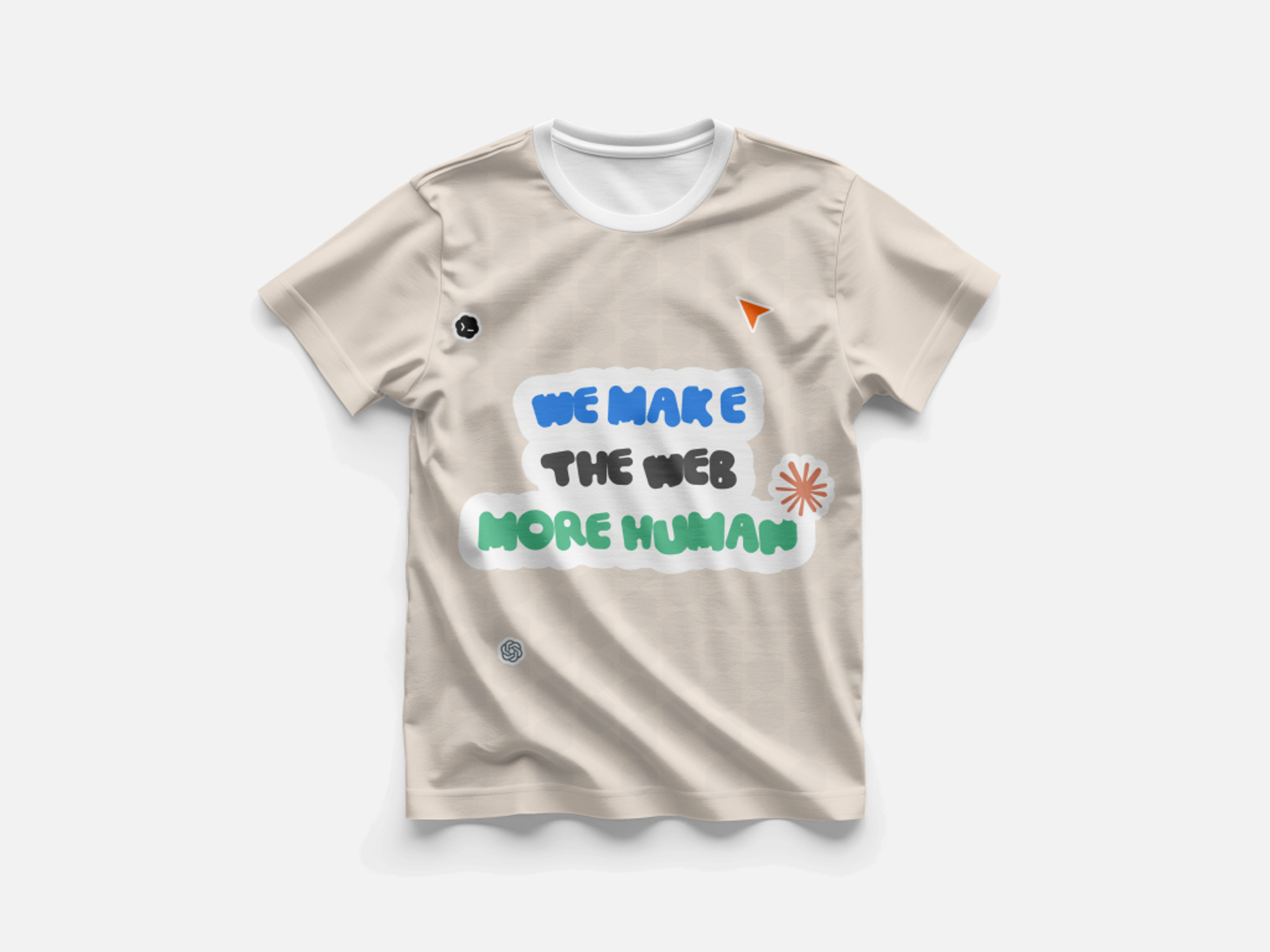 The sticker-style “We make the web more human” shirt in cream
