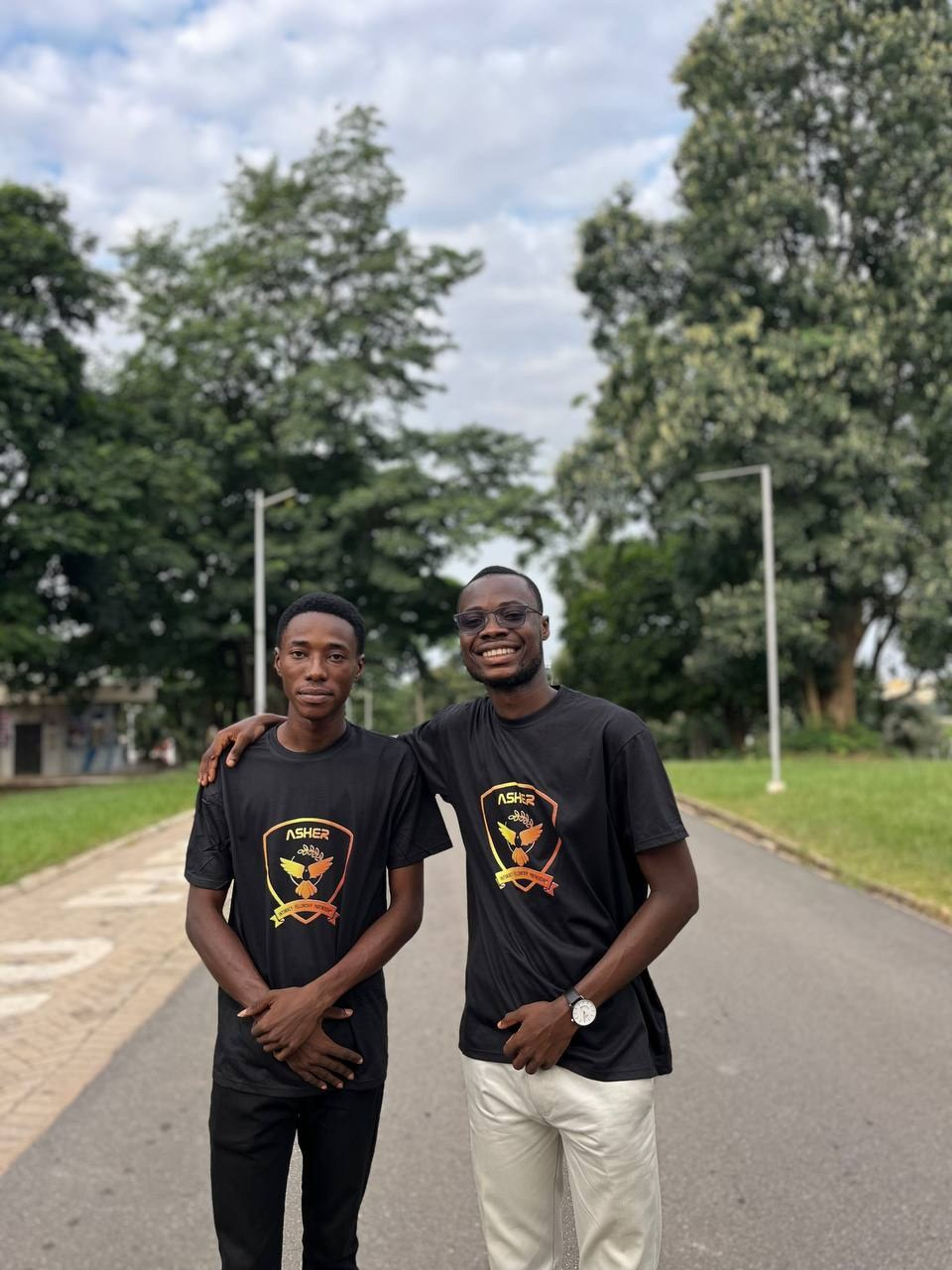 Asher Fellowship crest and tees 3