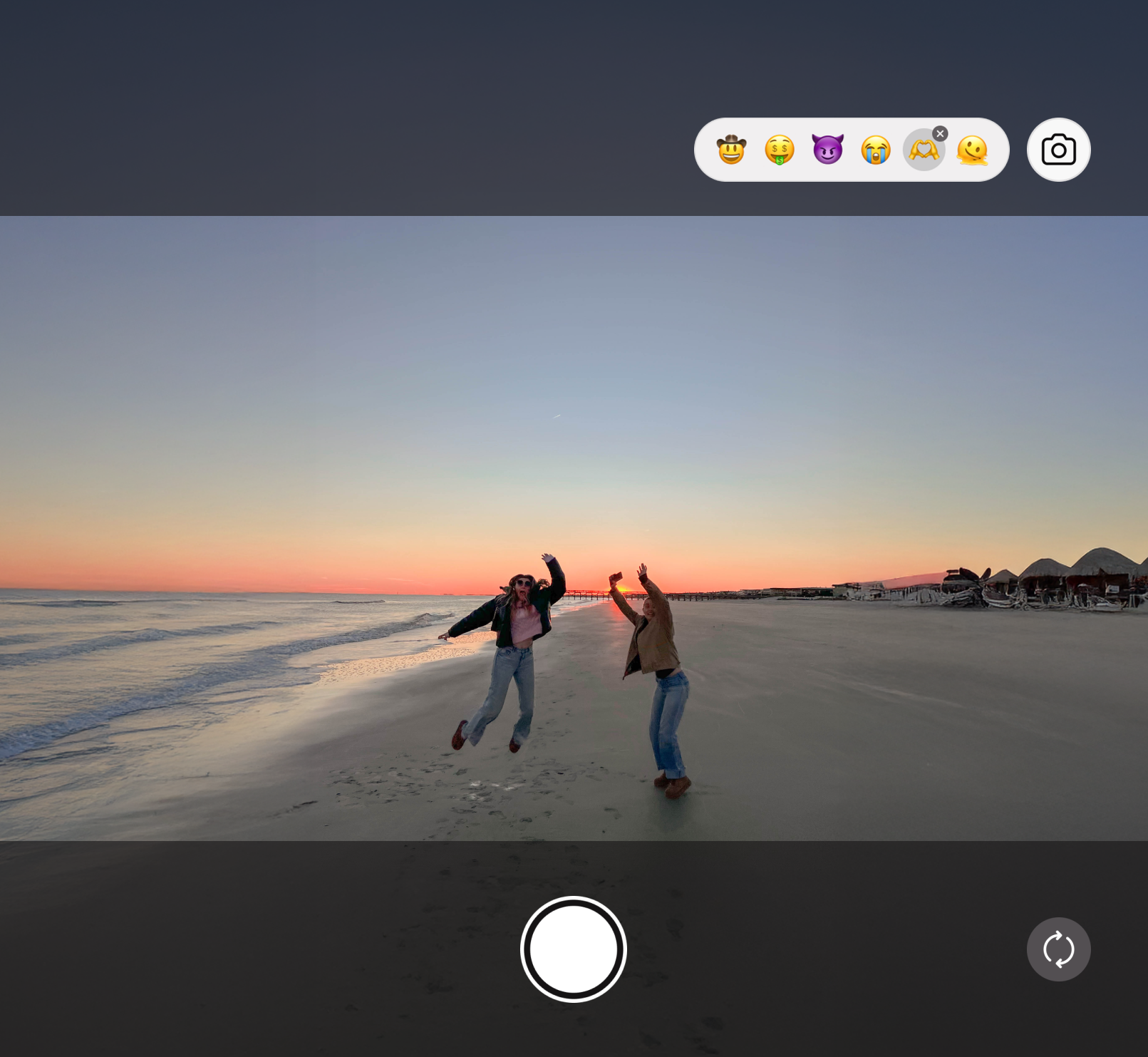 Friends enjoying the sunset together on the beach