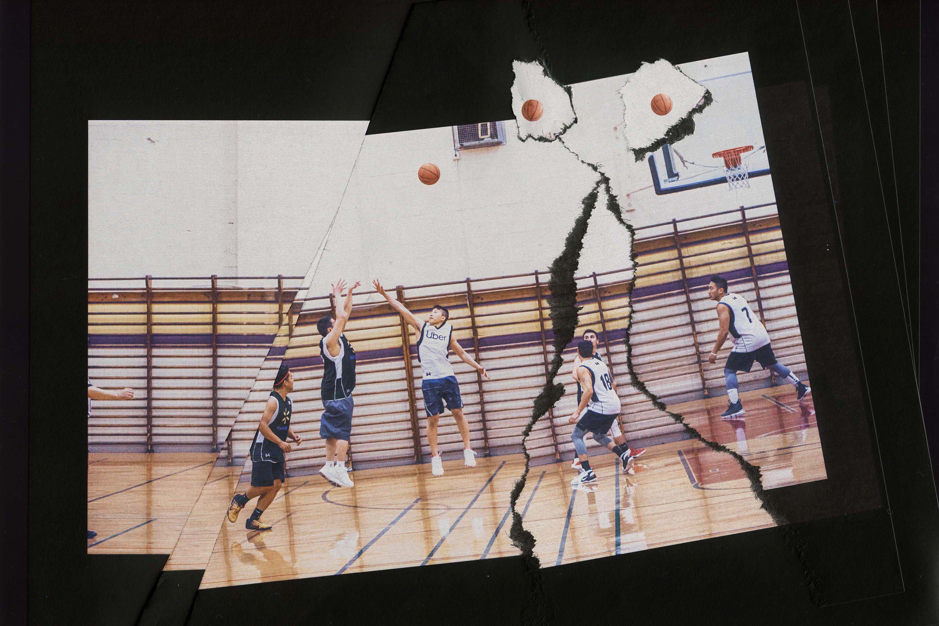 A basketball player taking a shot against the opposing team