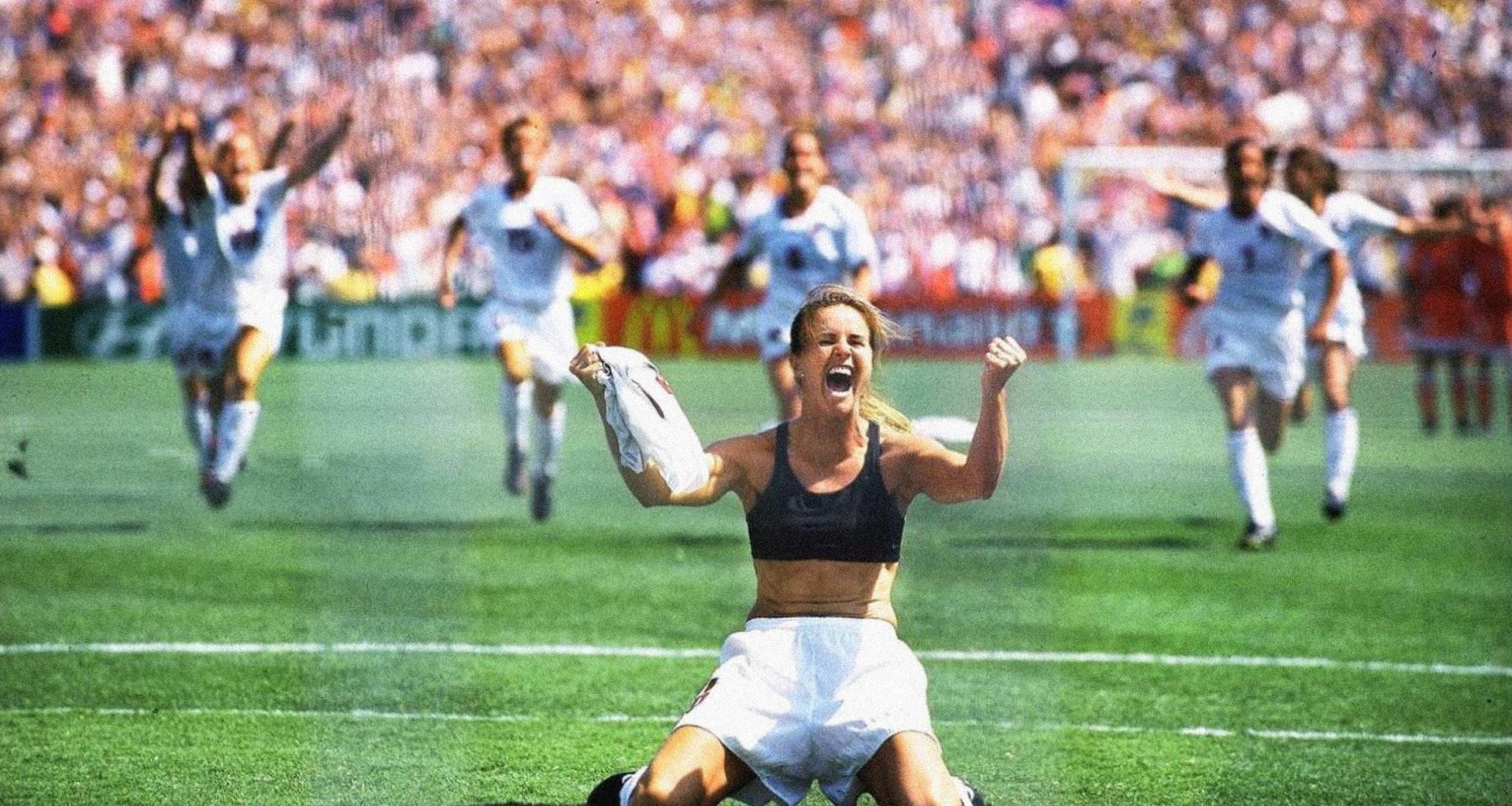 A soccer player celebrating on the field