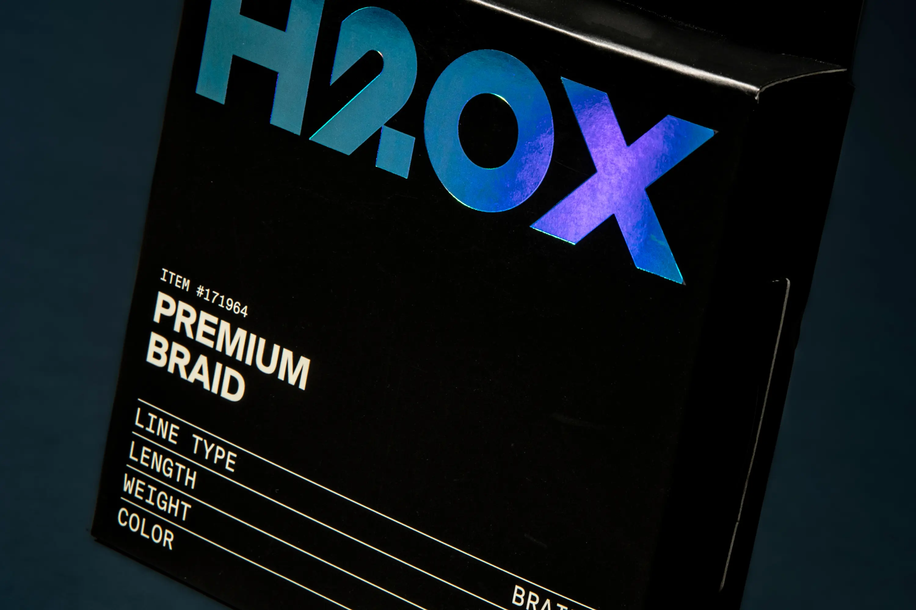 Box of H2OX fishing line on a dark blue background