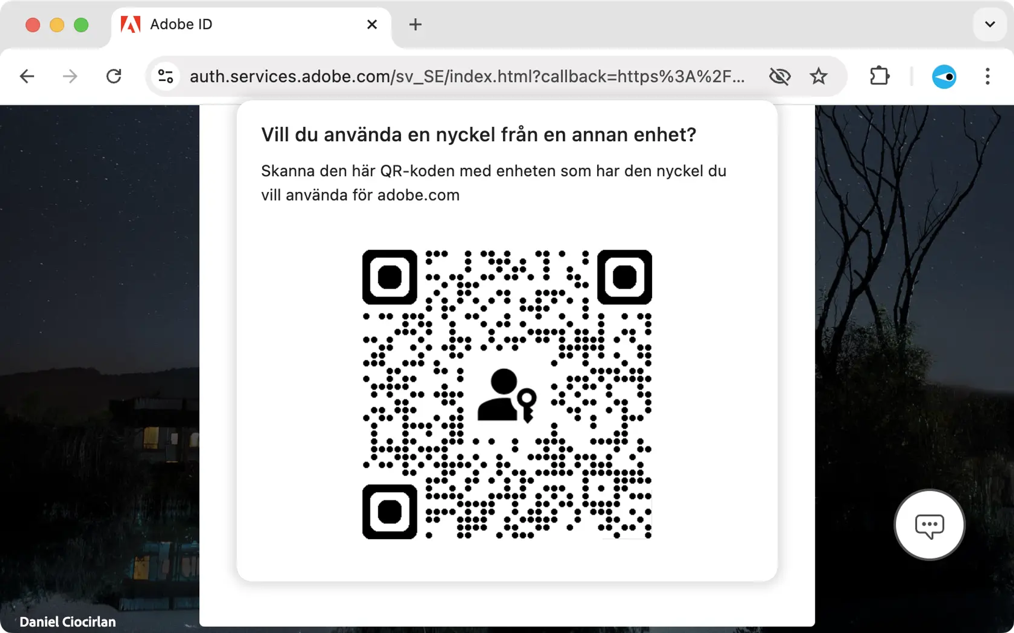 Skärmavbild av Adobes inloggningssida. Webbläsaren visar en stor qr-kod och ställer frågan: vill du använda en nyckel från en annan enhet?
