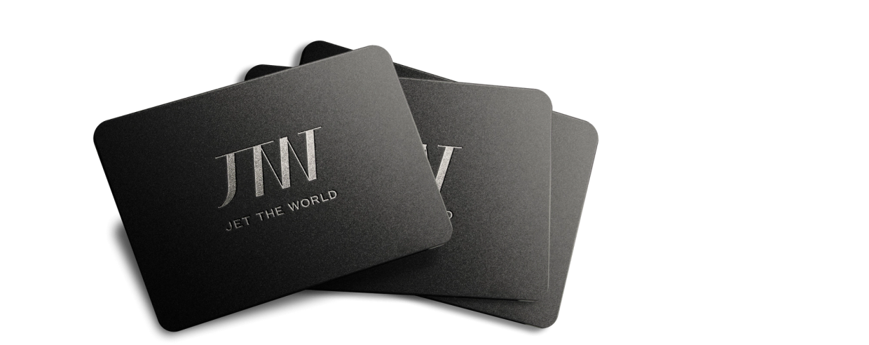 a stack of black business cards for jet the world