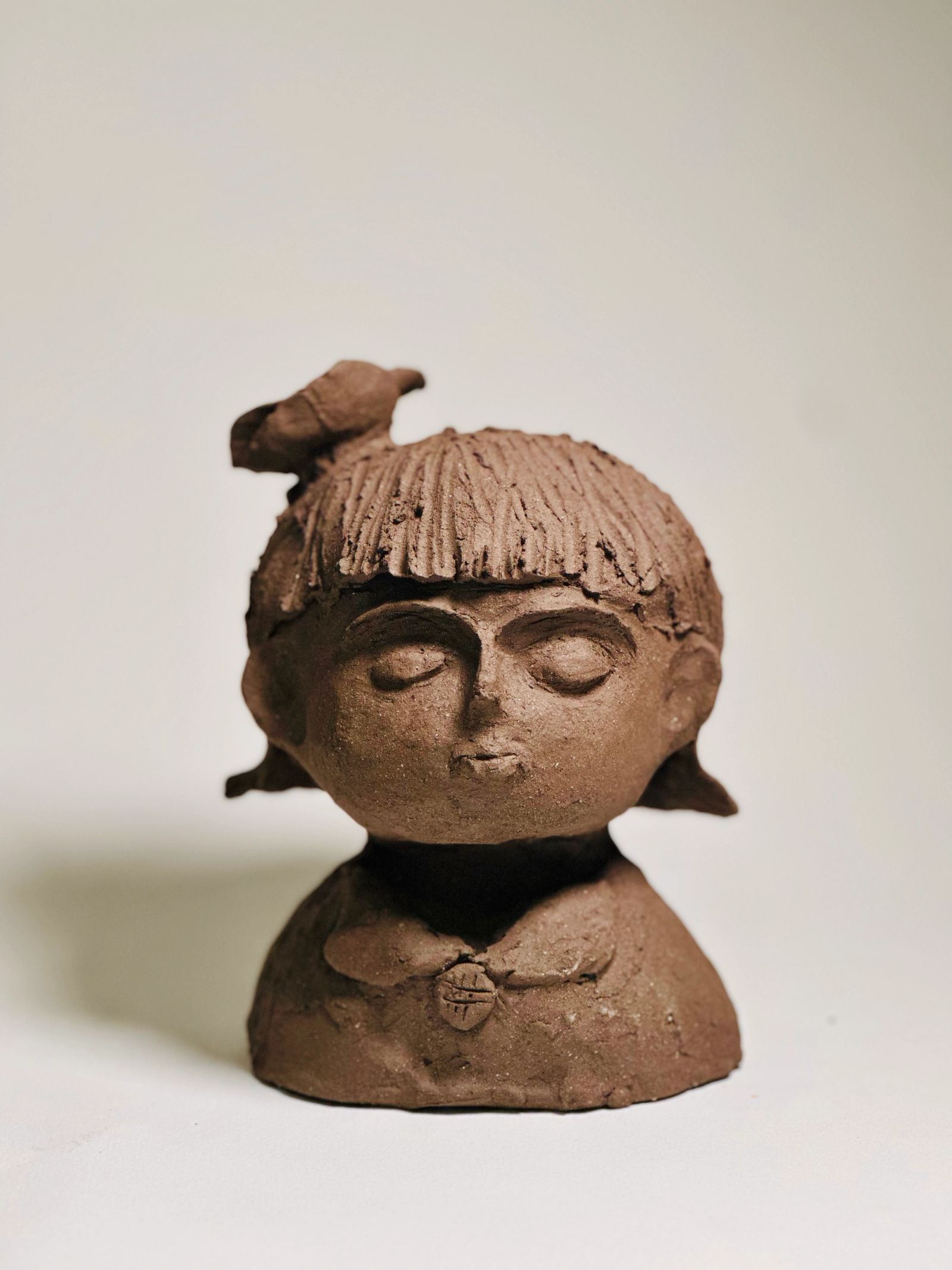Child Bust with Bird