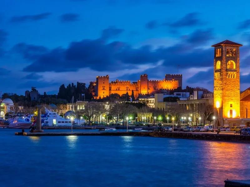 Mandraki Harbor Palace At Night, Rhodes, Greece