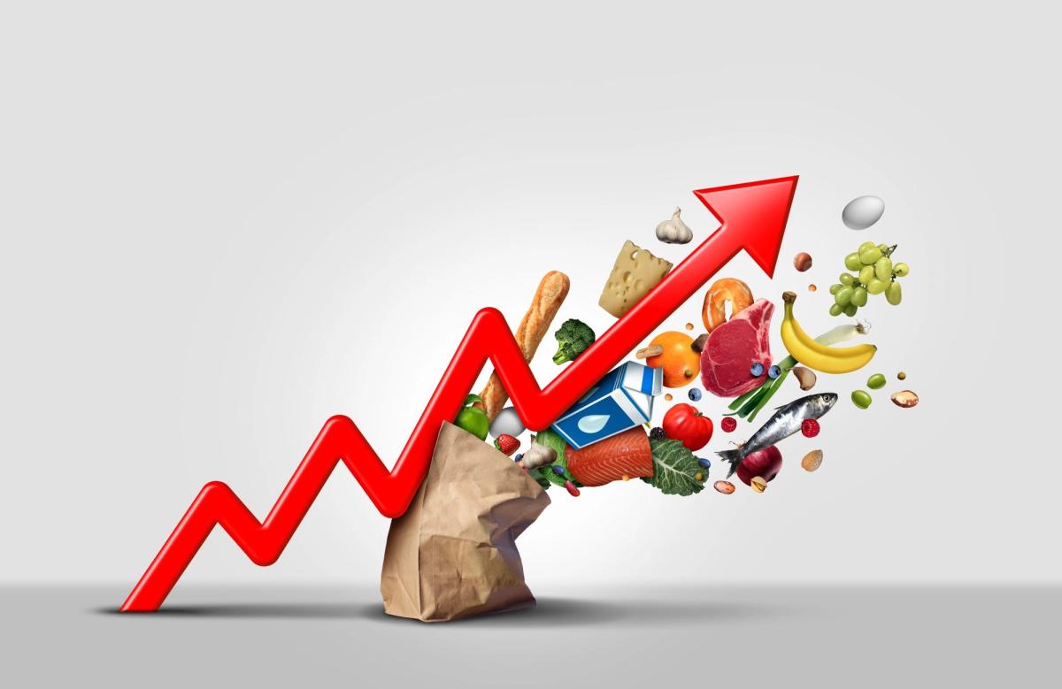 A red arrow pointing upward with food items emerging from its tip, symbolizing growth and abundance in culinary offerings.