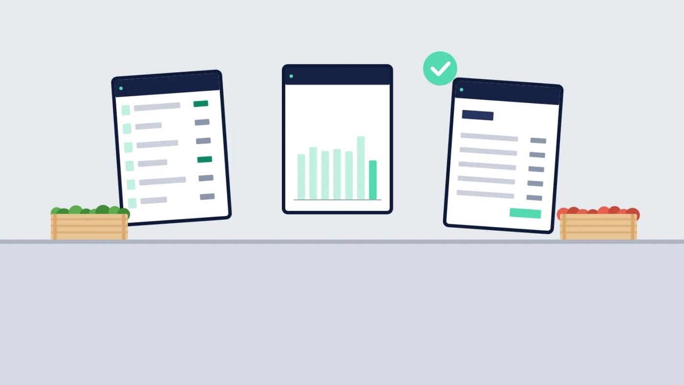 Illustration of three tablets on a kitchen bench comparing restaurant software, with one ticked.