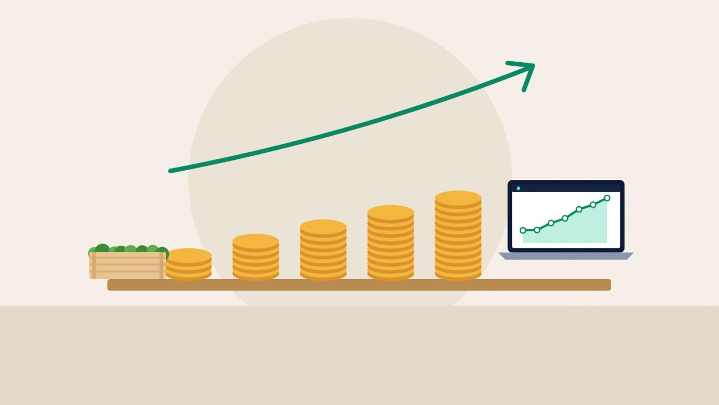 Illustration of growing stacks of coins beside a crate of produce and a laptop with a rising profit chart.