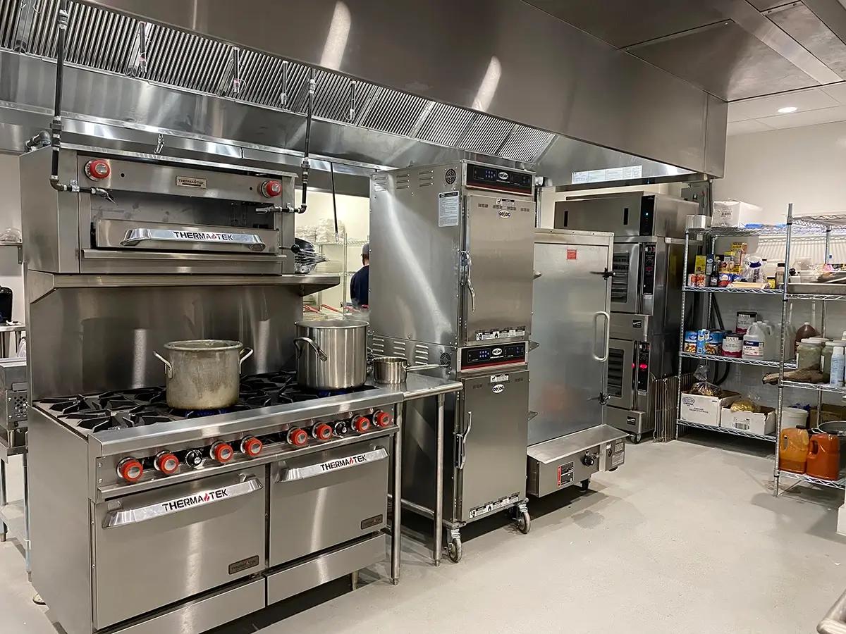 A commercial kitchen with commercial-grade equipment.