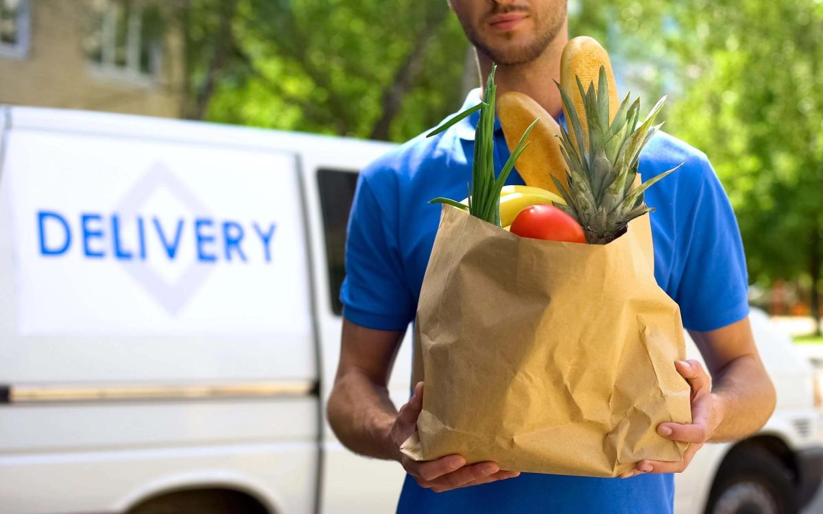 A man delivering fresh produce.