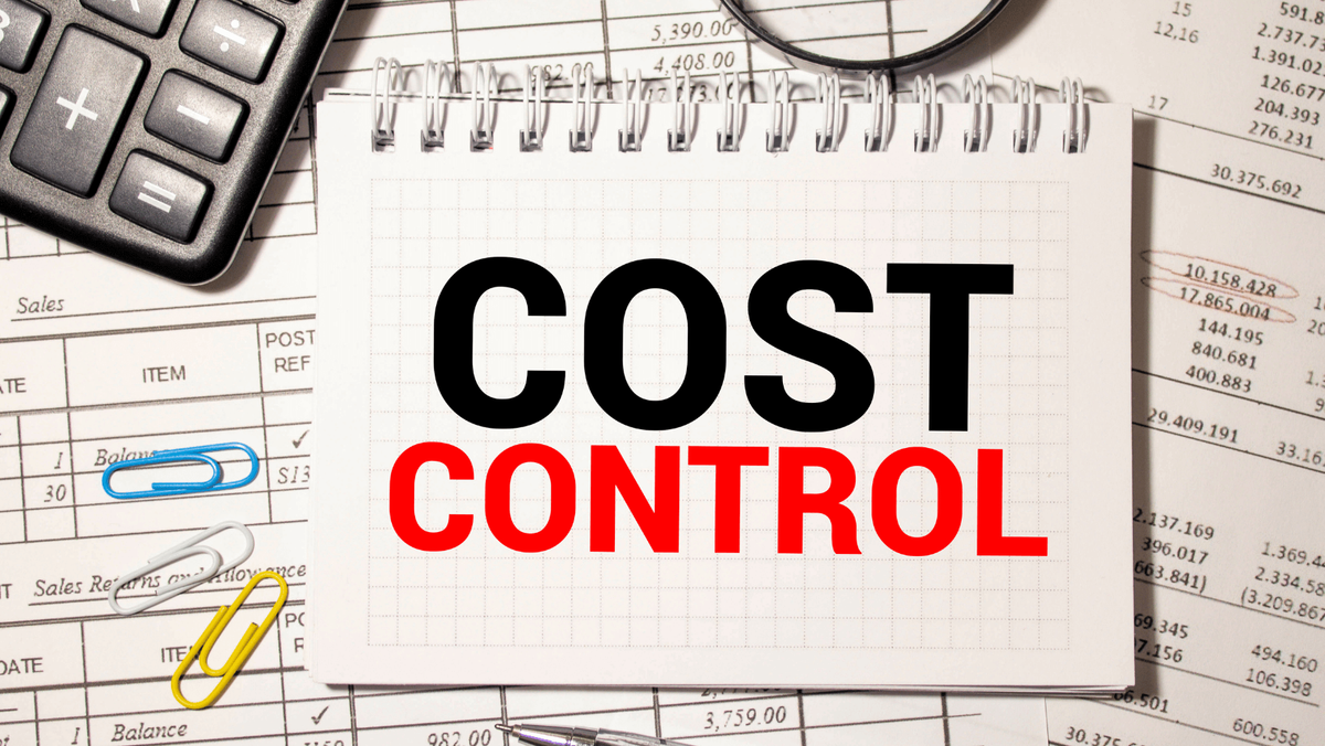 A paper with the word "cost control".