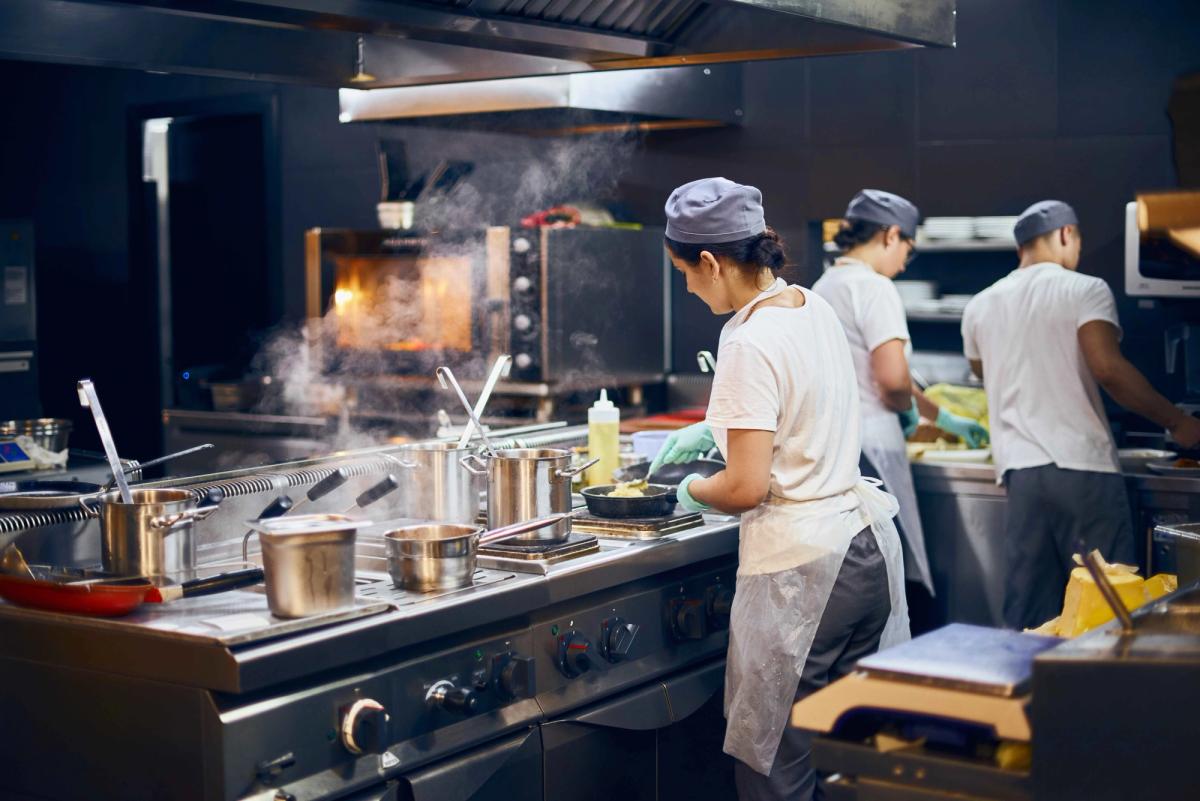 Busy chefs working in the kitchen.