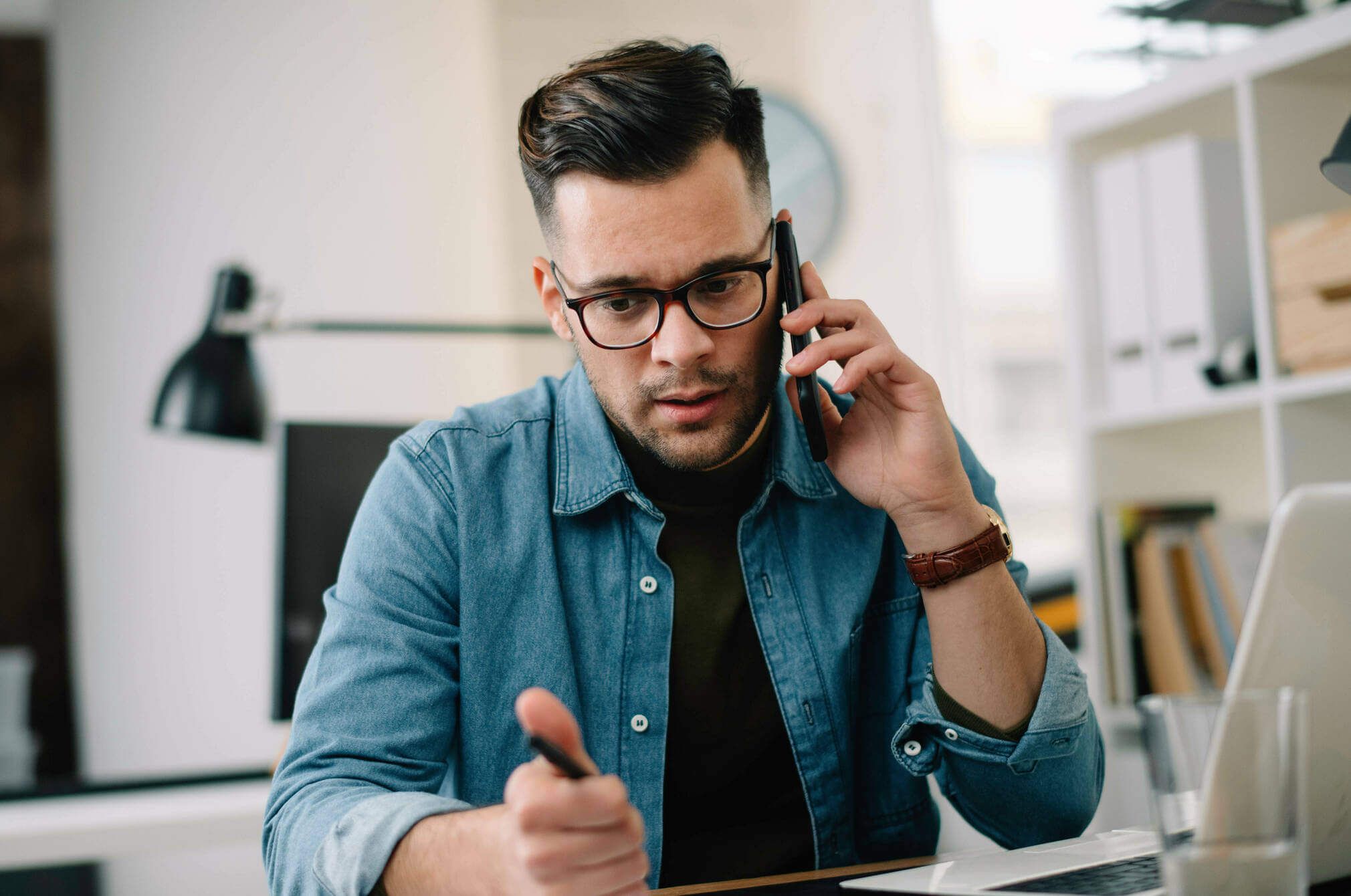 A man talking on the phone.