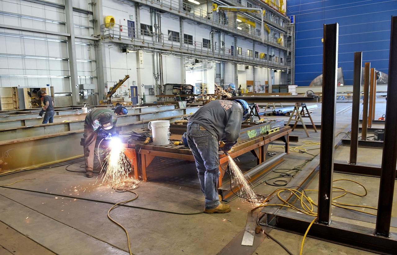 Workers Welding Photo
