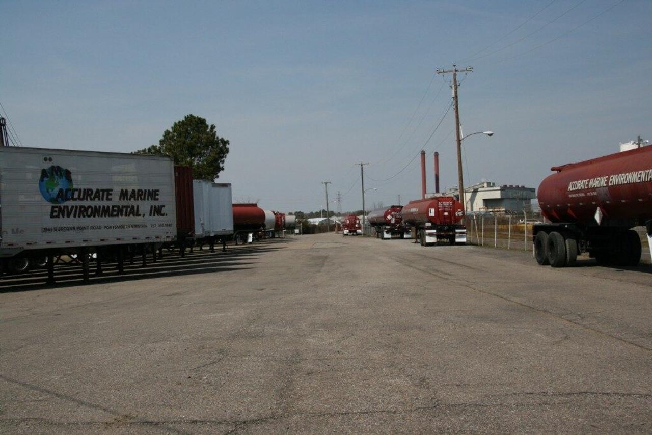 Tankers and trailers in parking area