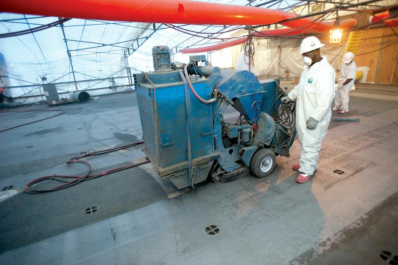 Worker applying Marine Decking
