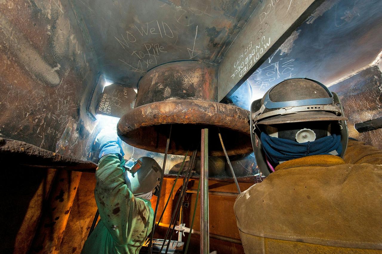 Radiance of the Seas workers welding
