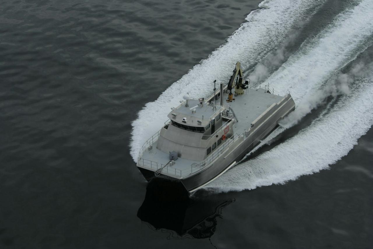 Debris Recovery Vessel running at top speed