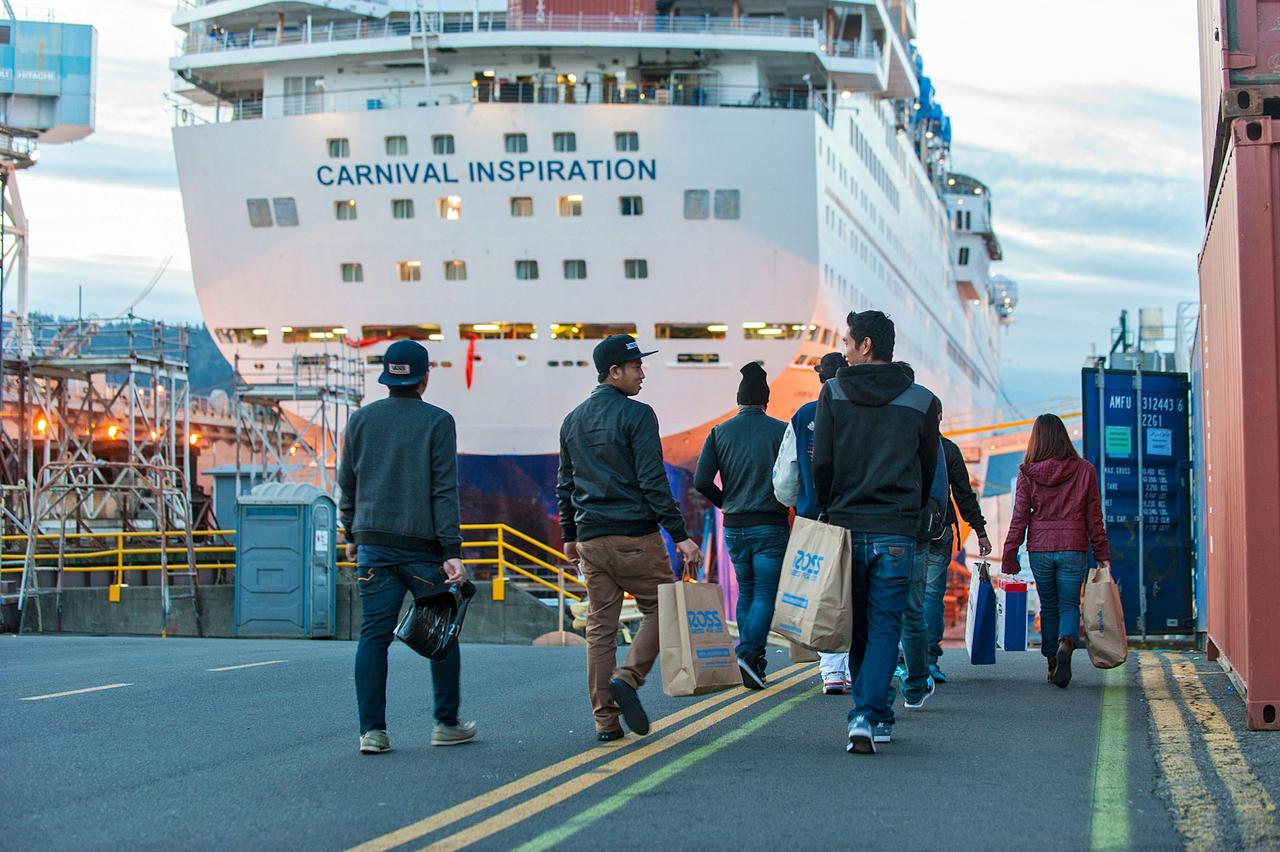 Passengers returning to the Carnival Inspiration