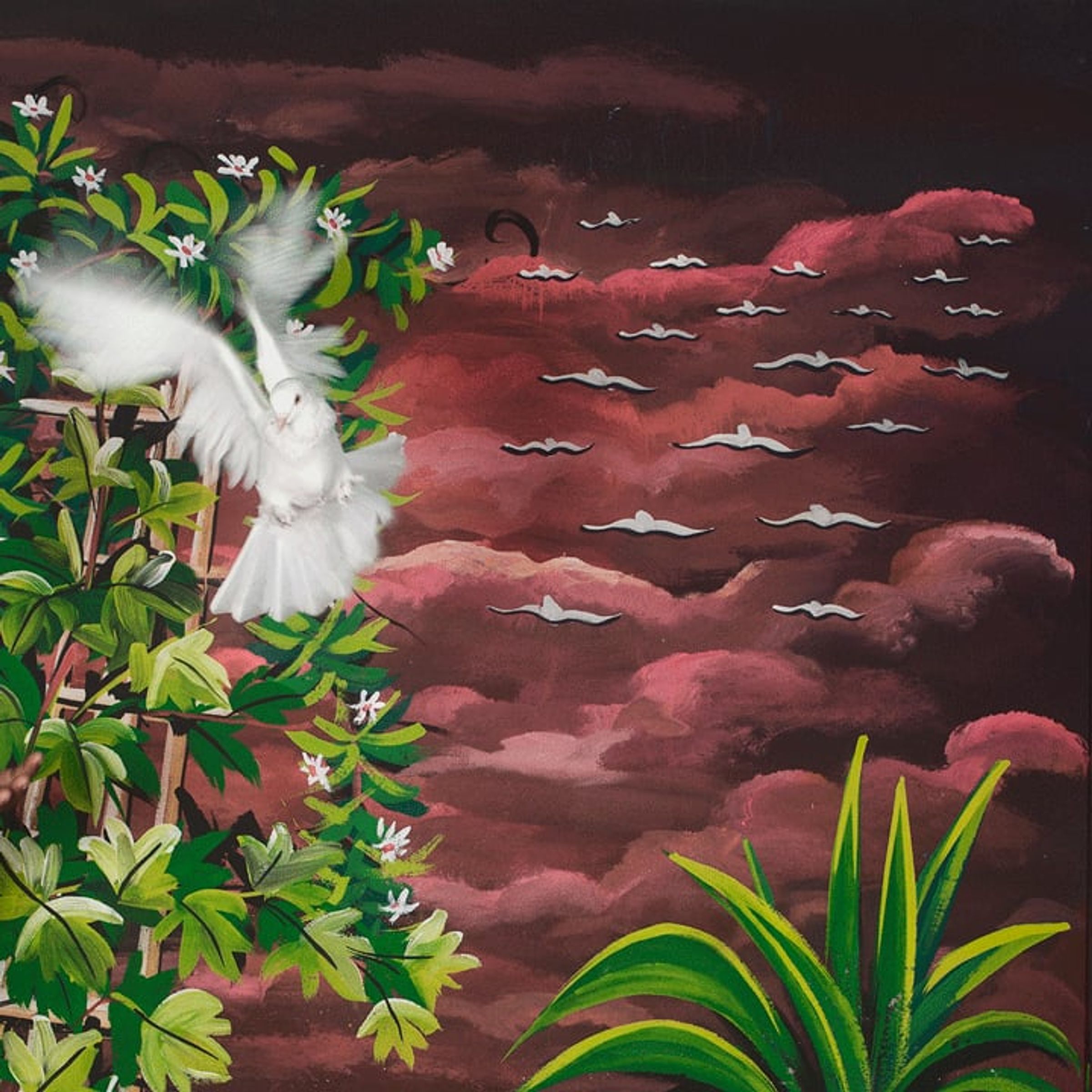 White bird flies across a painted sunset sky bordered by green leaves.
