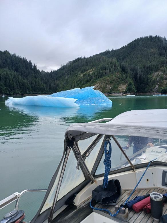 Blue ice in the water by a glacier