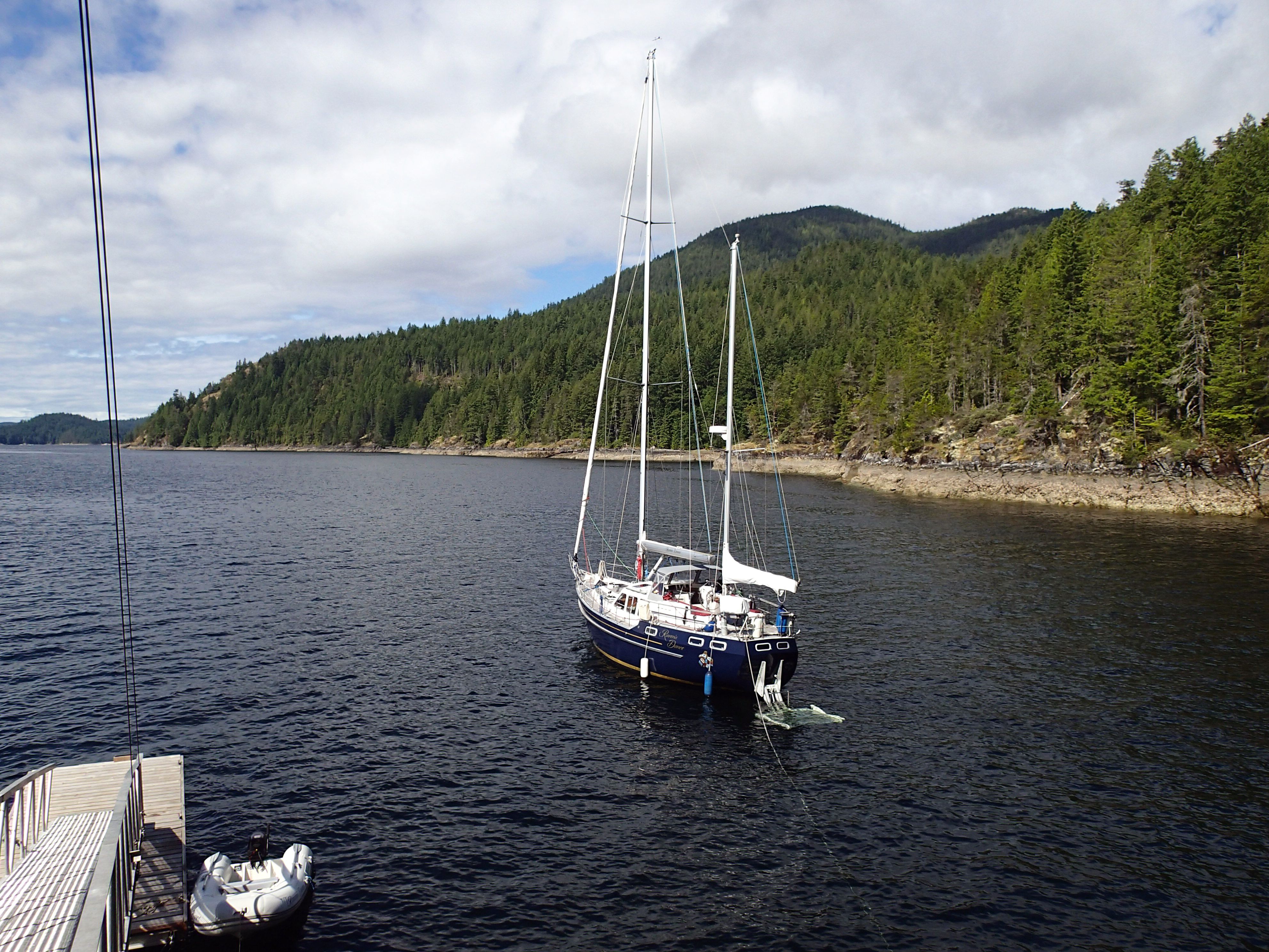 Raven's Dance anchored with stern tie in a protected cove
