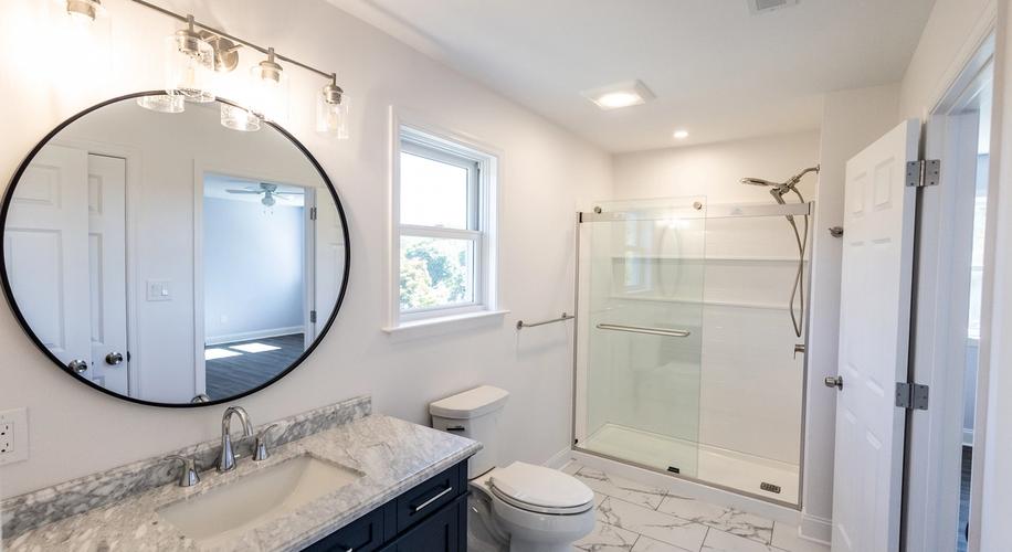 EFFORTLESS ELEGANCE: GUEST BATHROOM RENOVATION interior design project showcase - Before and after transformation by Bonae Interiors