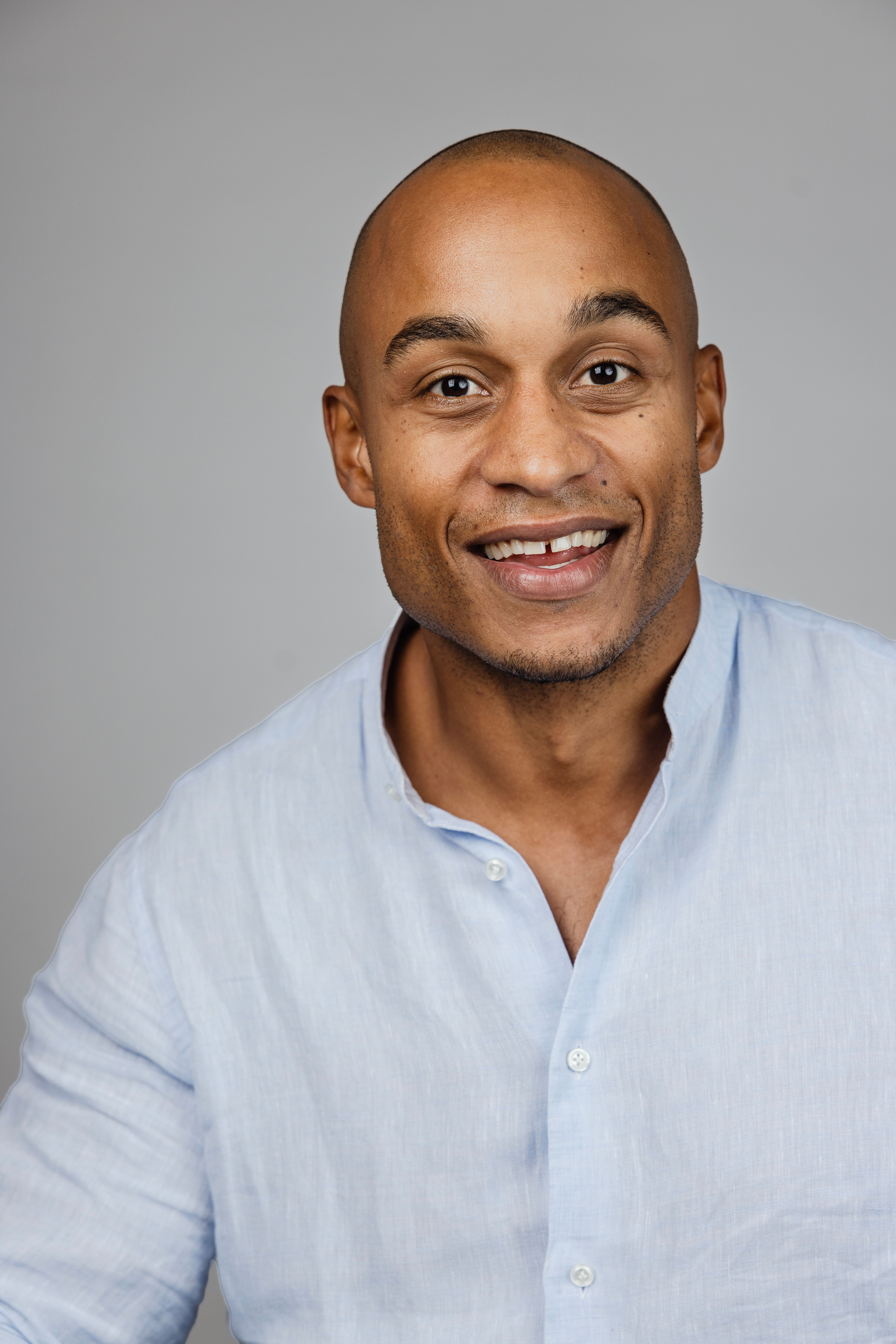 Man wearing a white shirt.