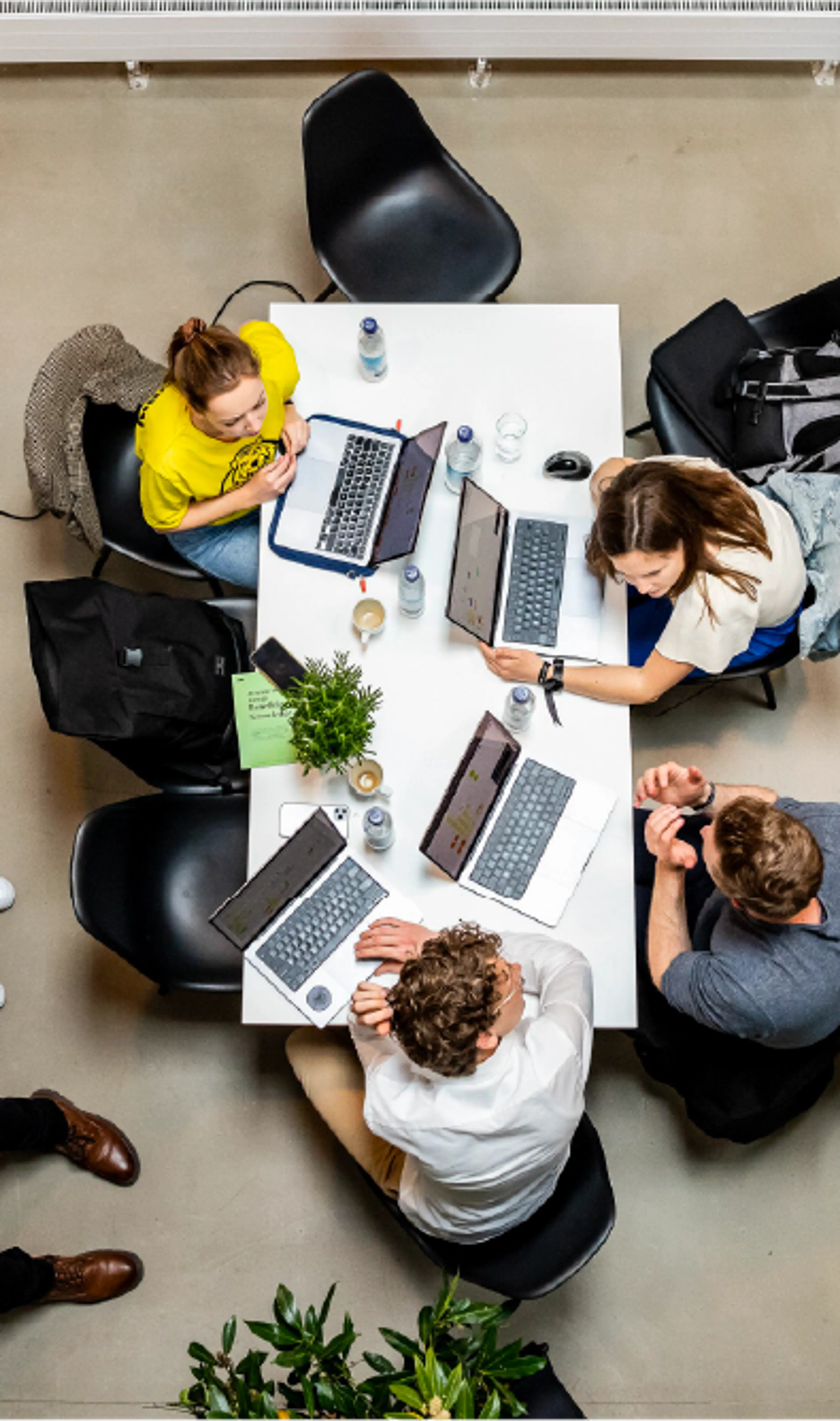 People in a meeting room.
