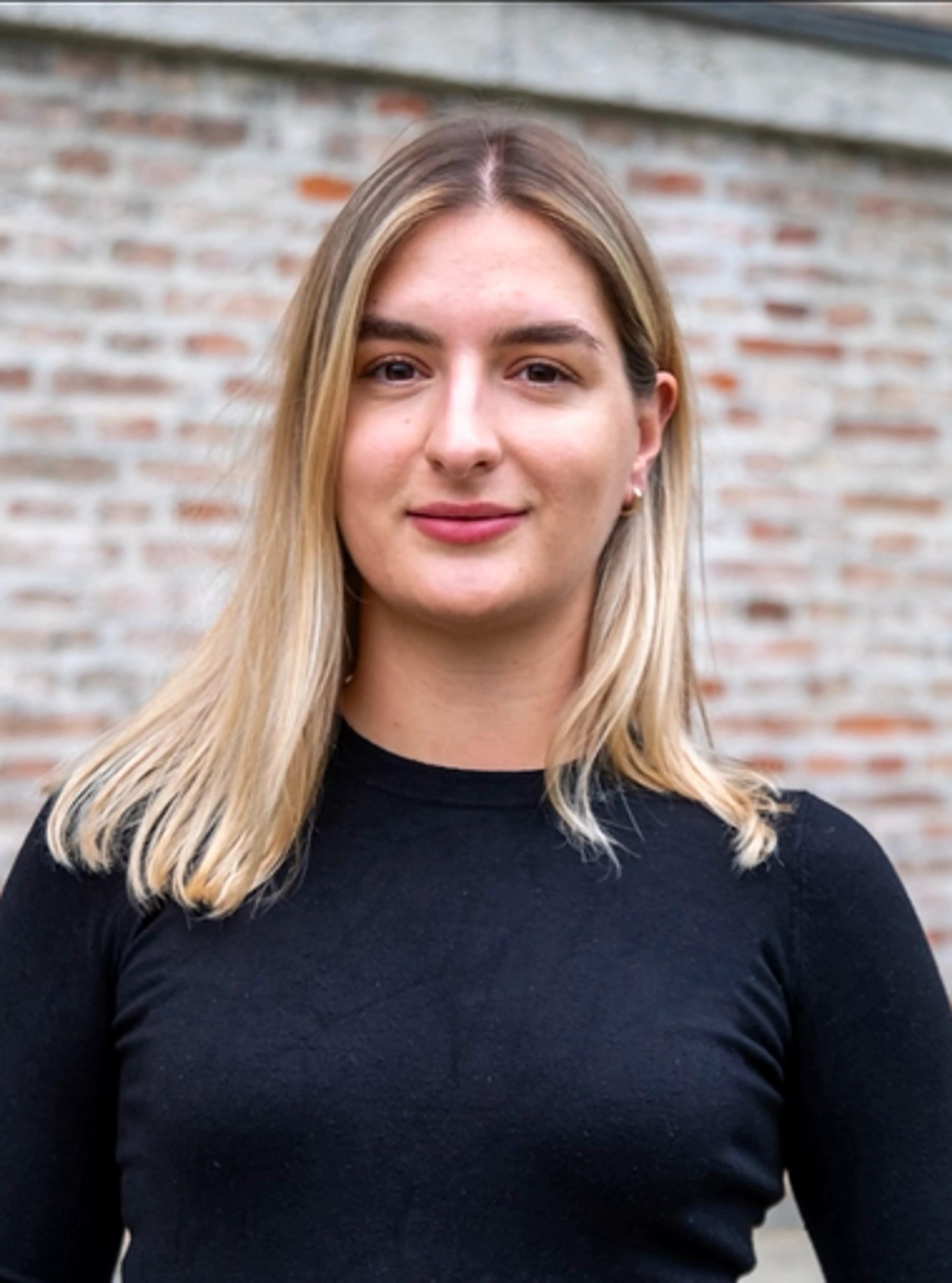 Smiling woman wearing a black shirt