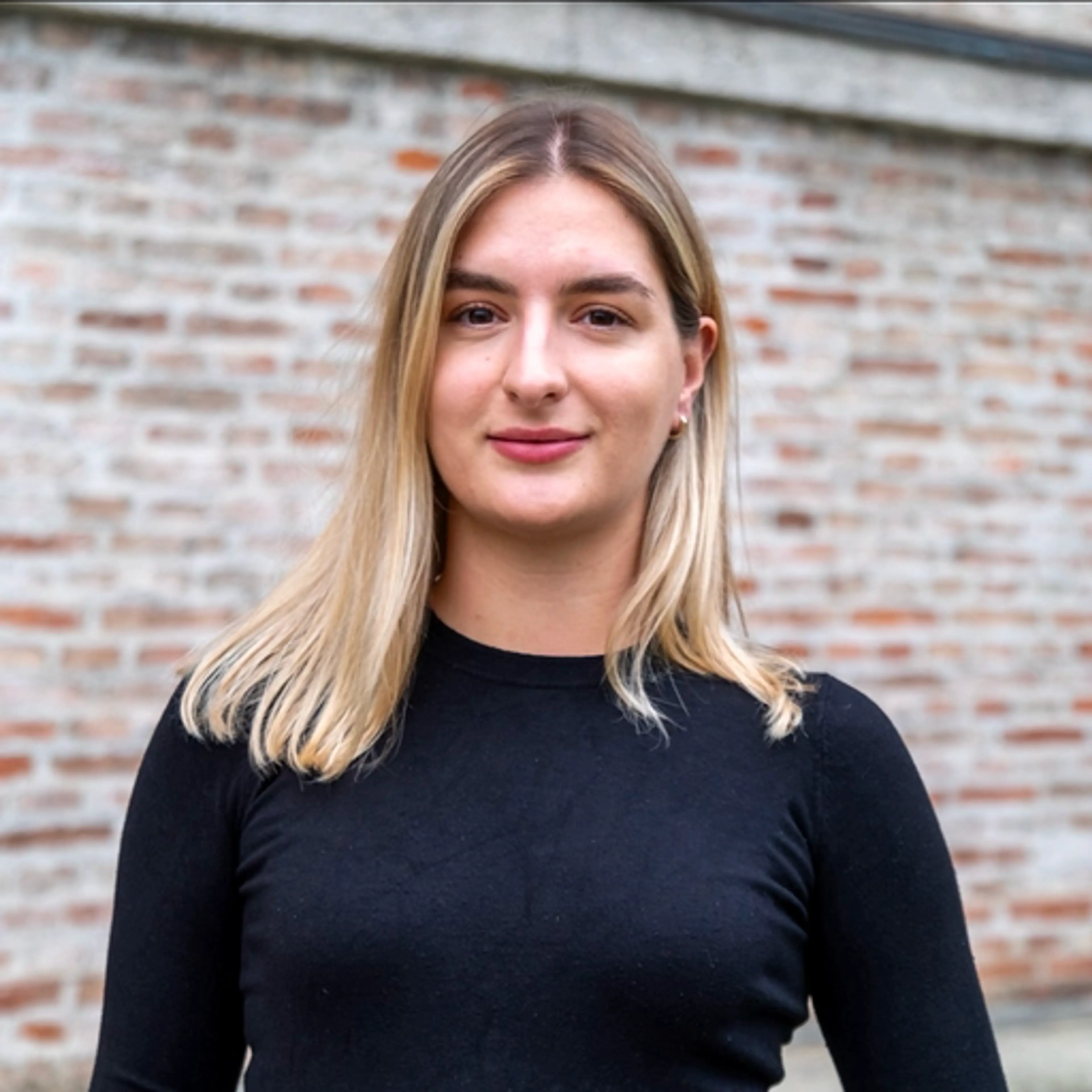 Smiling woman wearing a black shirt