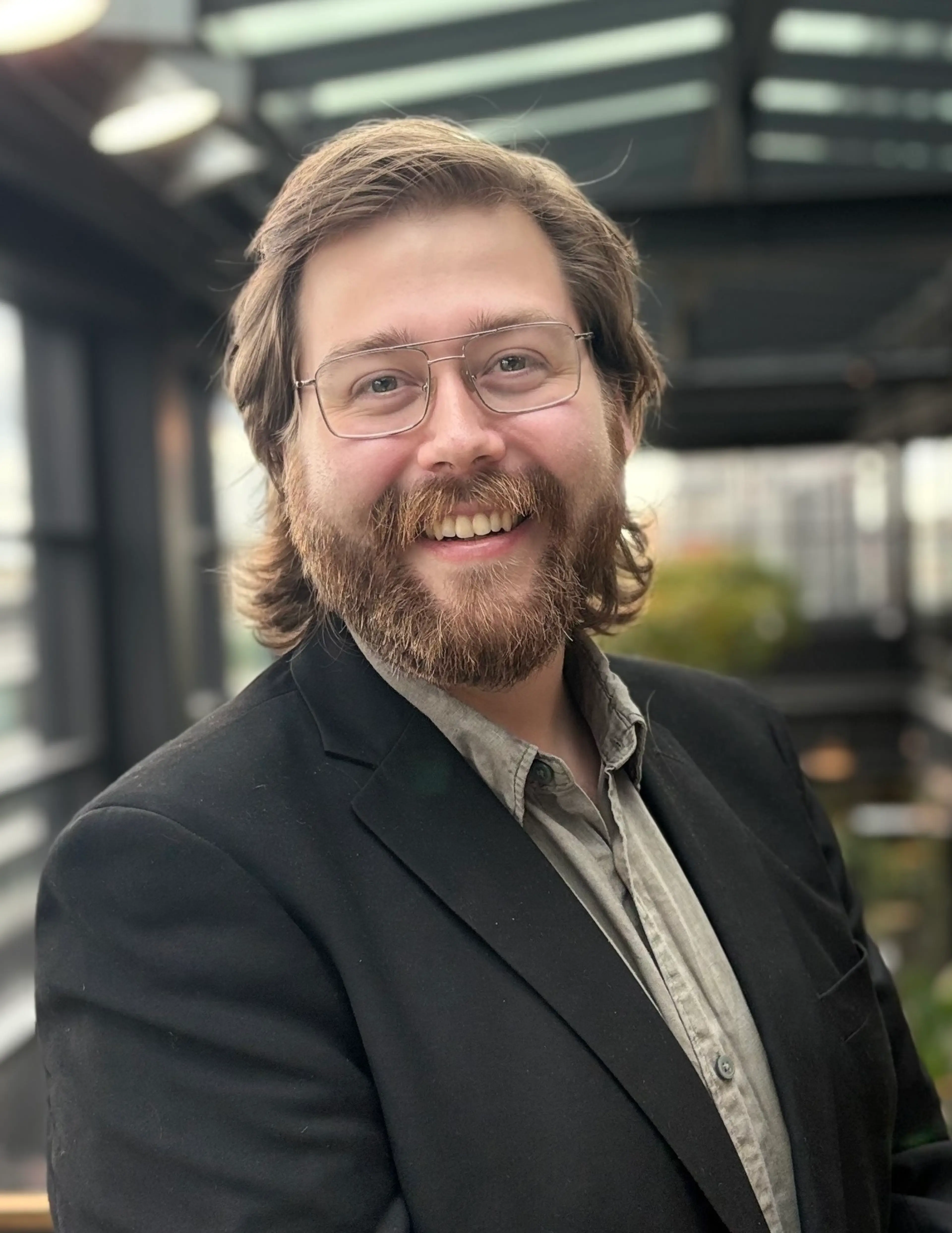 Man wearing a blue shirt.