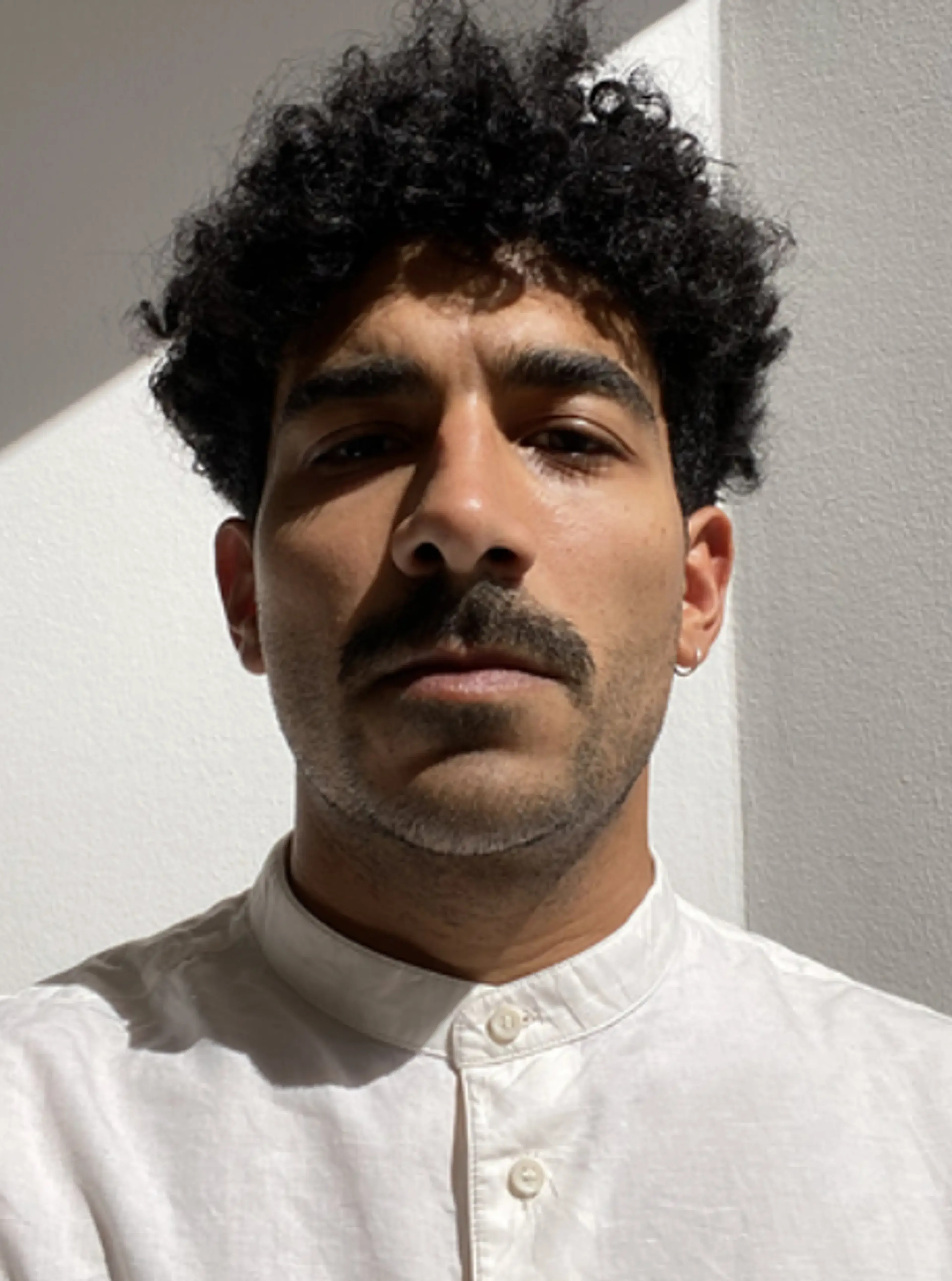 Man wearing a white shirt