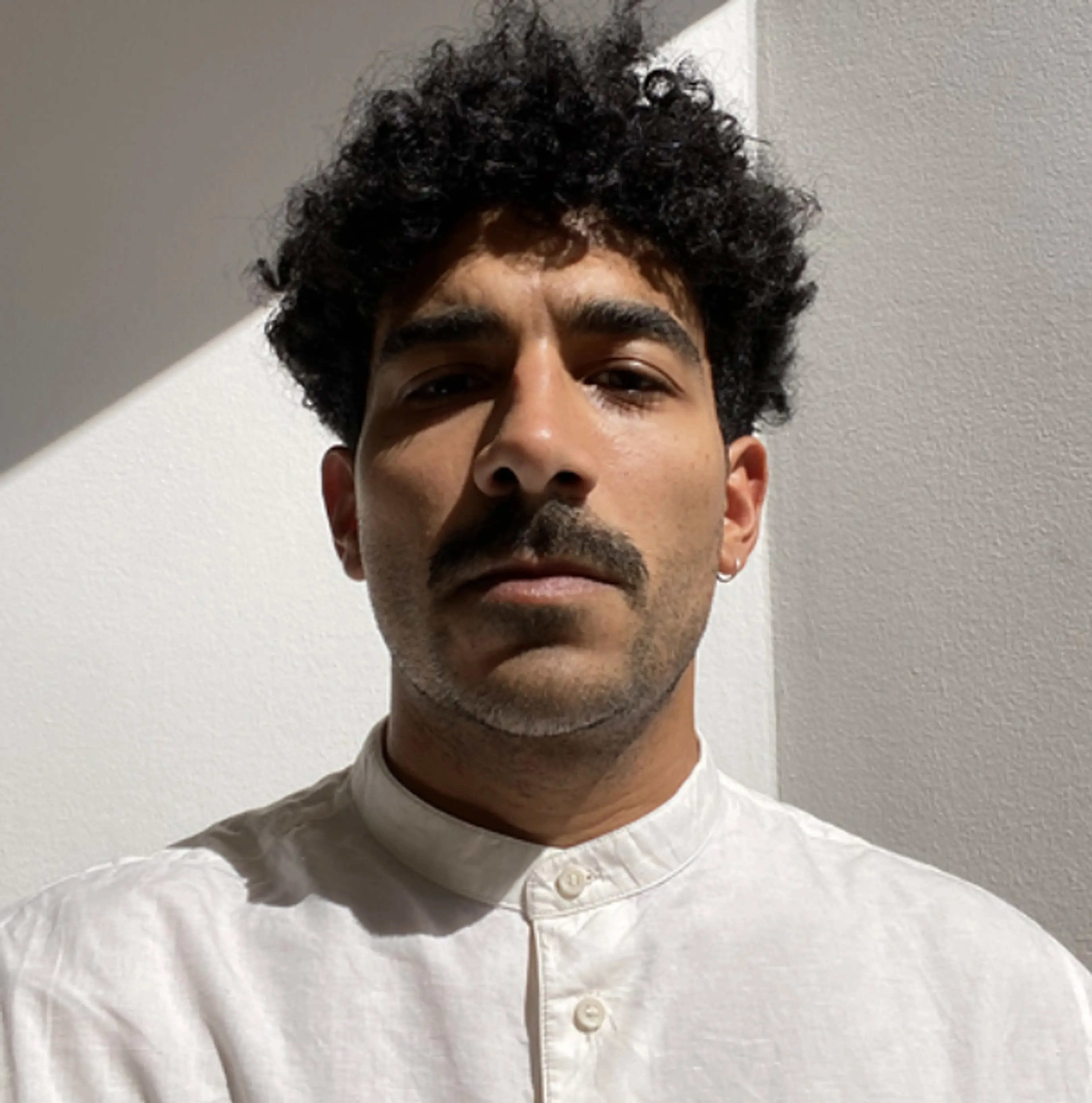 Man wearing a white shirt