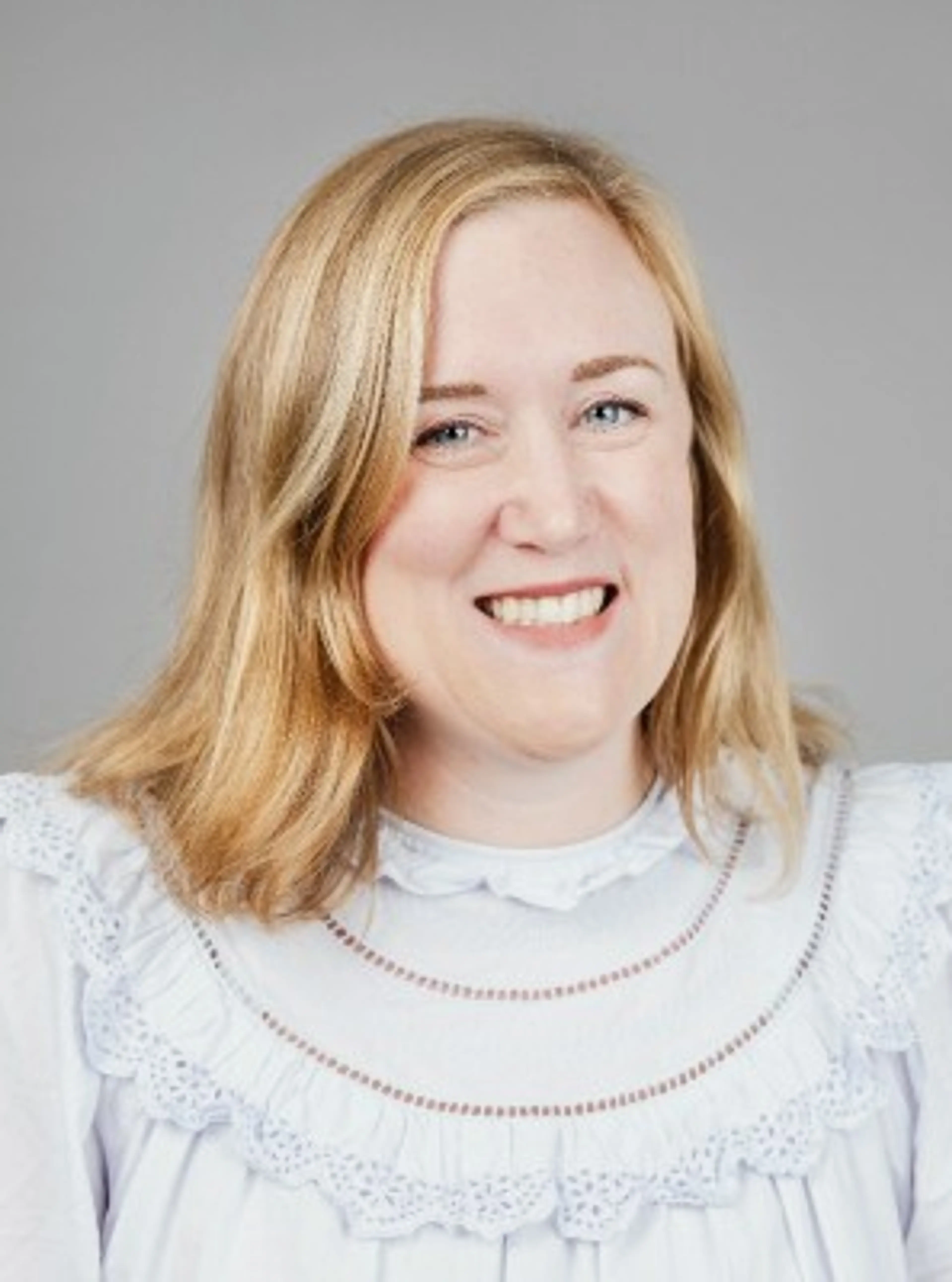 Woman wearing a white shirt.