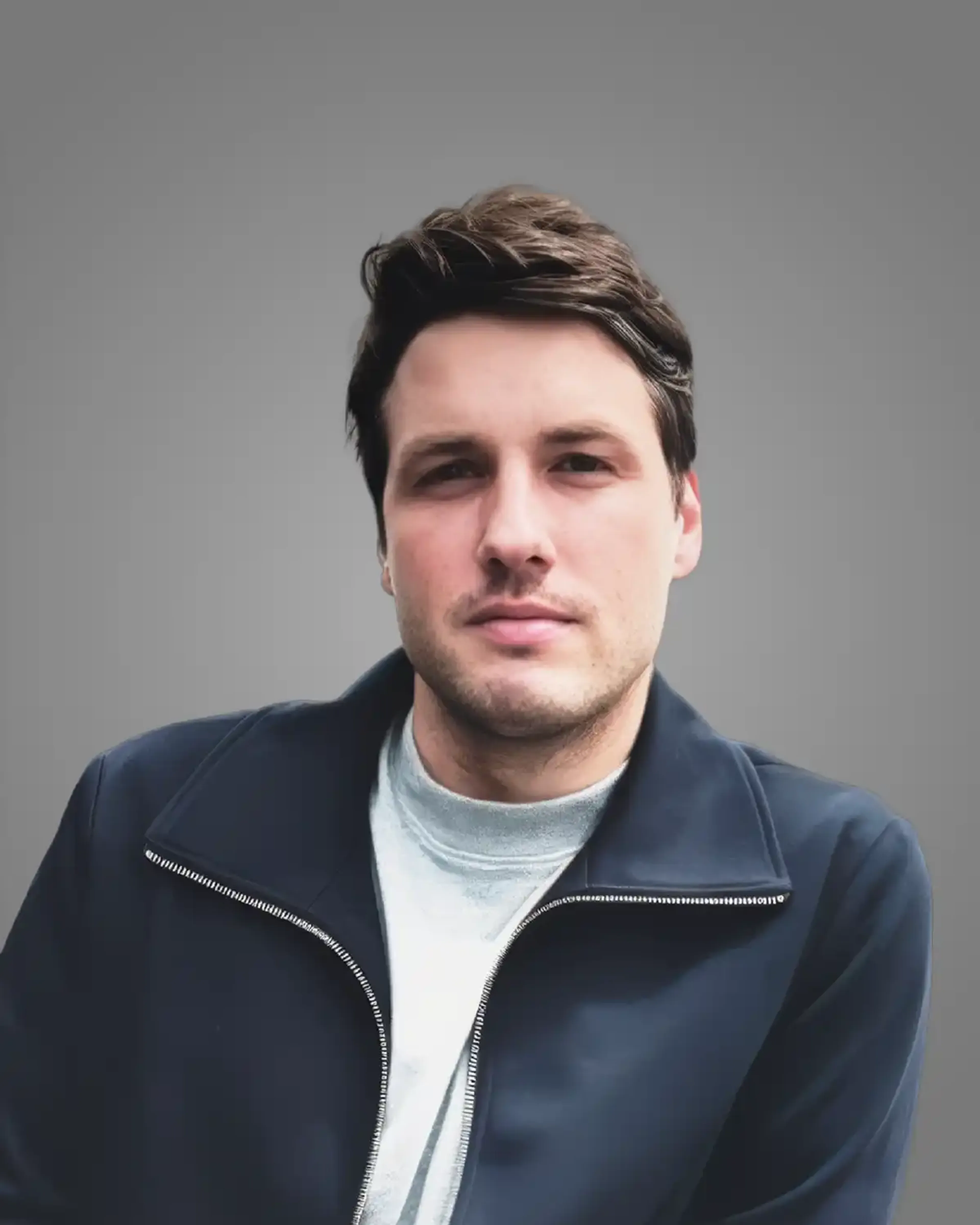 Smiling man on balcony.